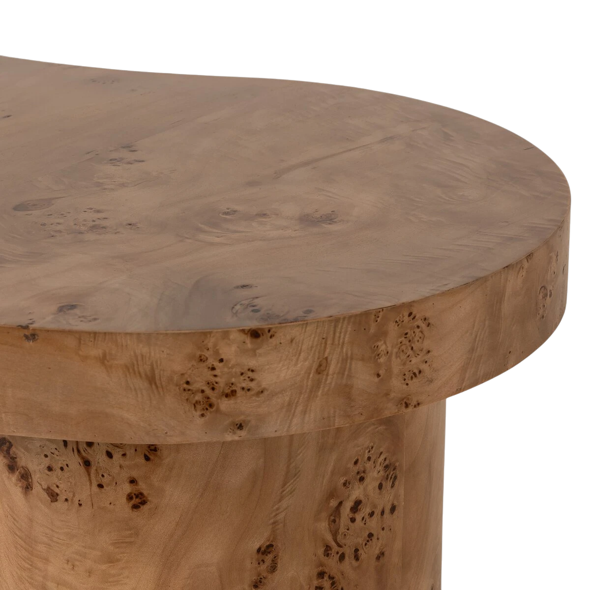 Close-up of the Eclipse Desk showing the rounded tabletop edge and richly patterned burl wood grain across the surface and pedestal.