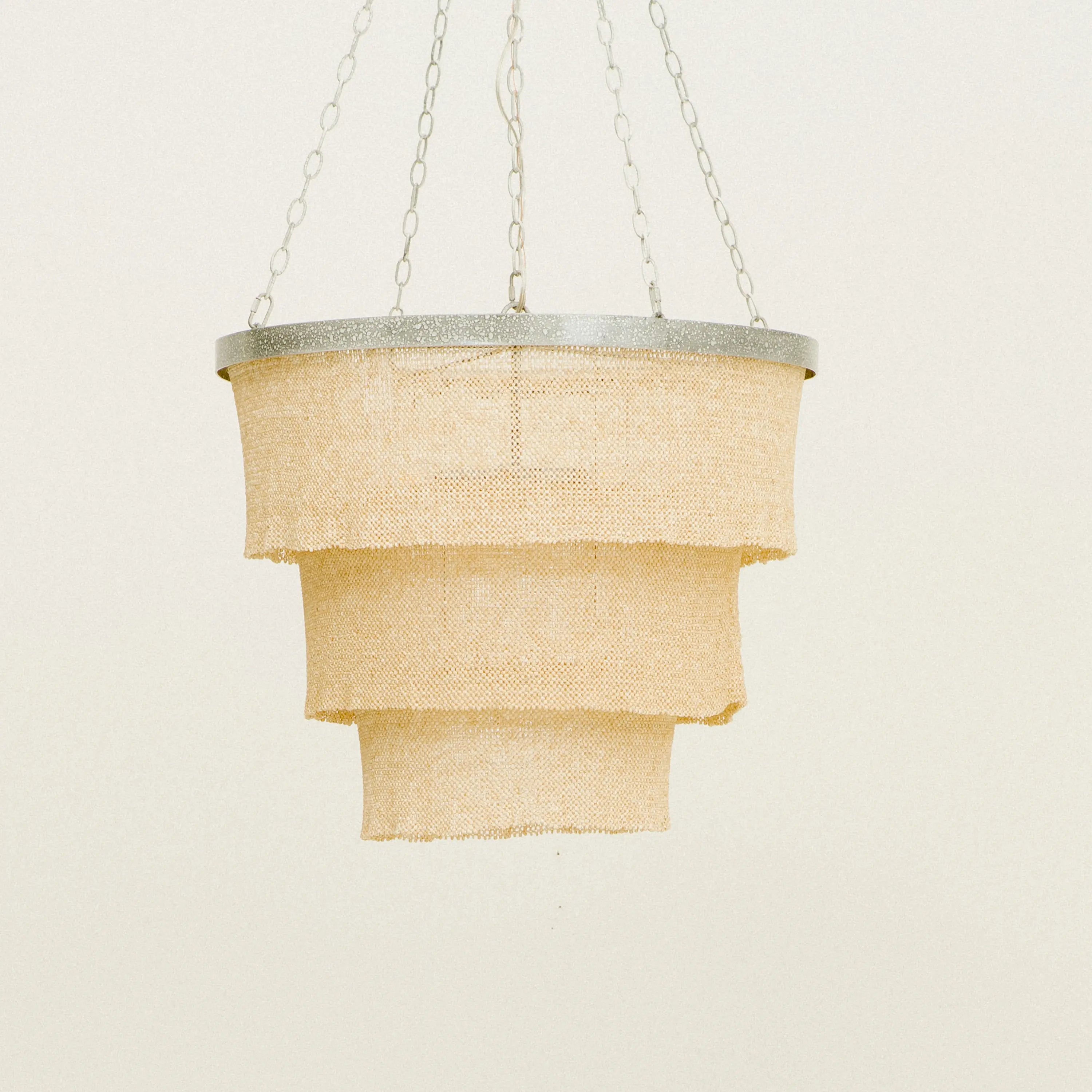 The Tiered Coco Bead Chandelier features clingy panels.