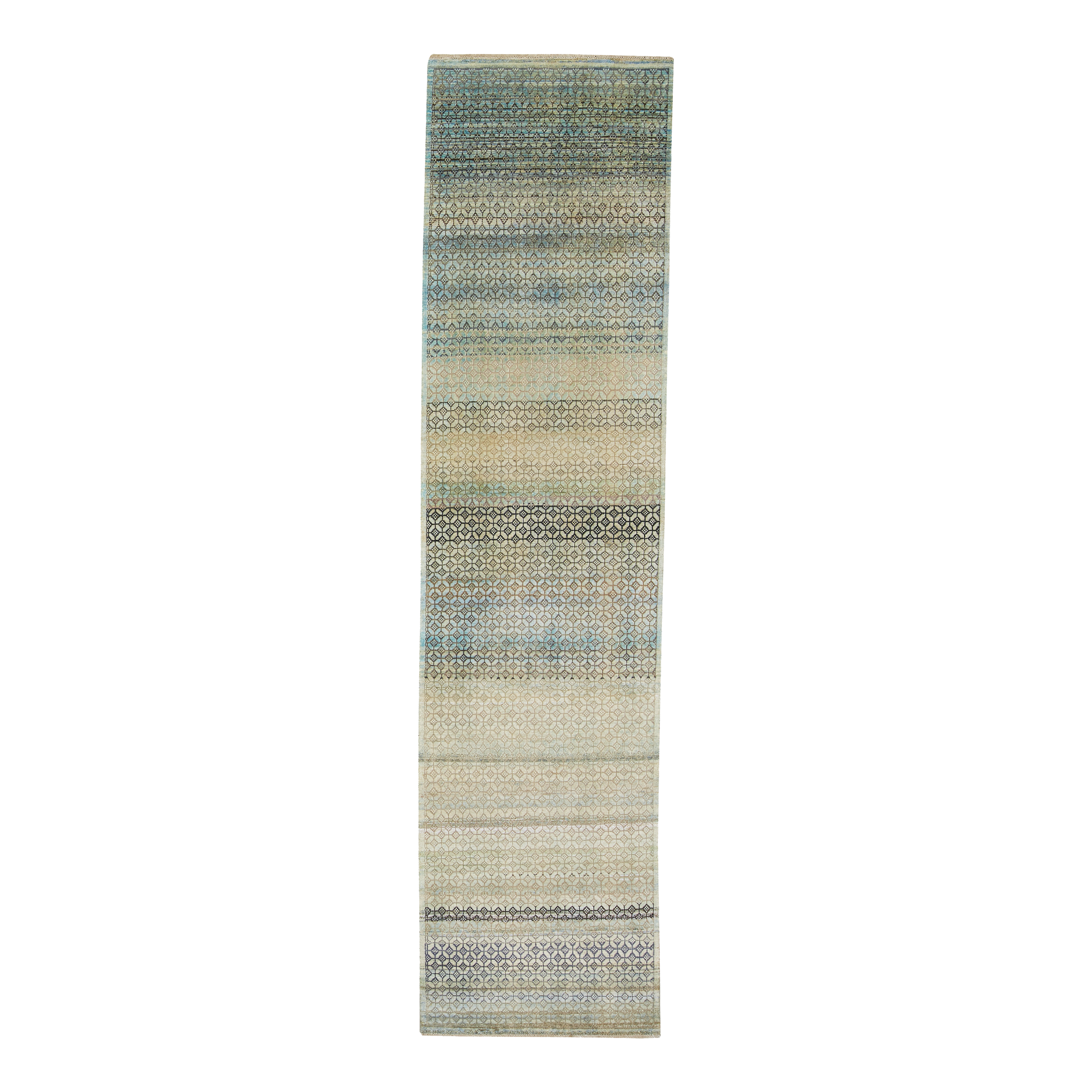 Designed to be passed through generations, the New Heirloom Rug Collection is crafted from recycled and upcycled wool, cocoon silk and sari silk.