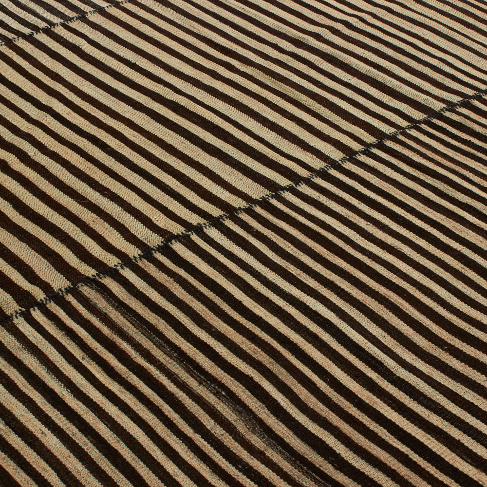 With a focus on minimalist design, our Tribal Kilim Collection features new, vintage and antique rugs that fit well with modern interiors.