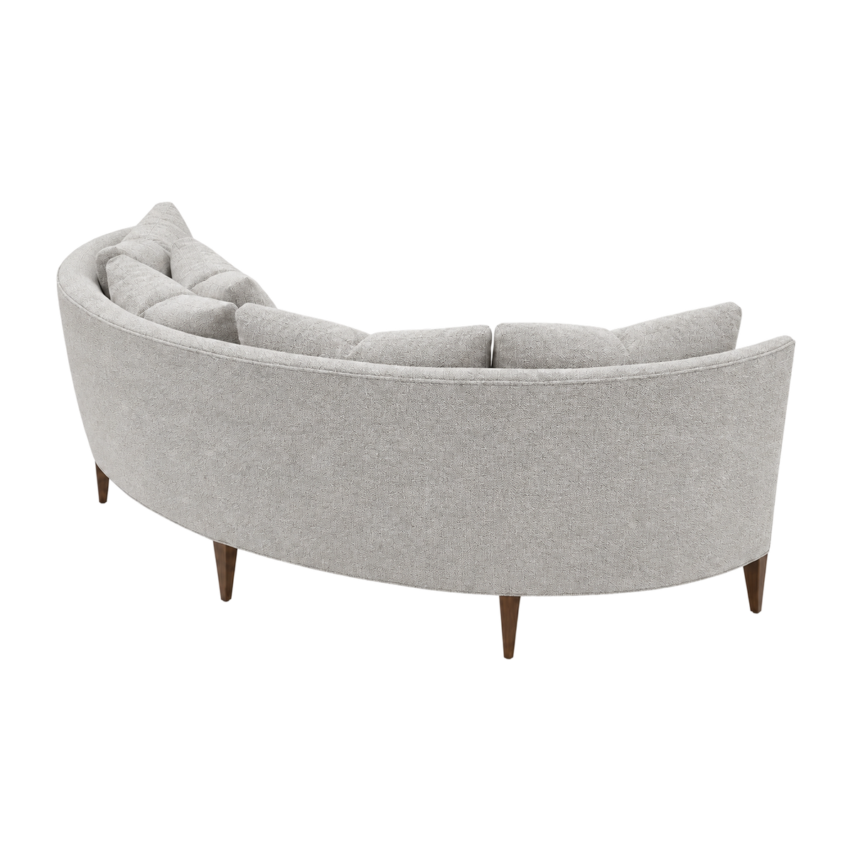 Rear three-quarter view of the Parker Sofa in oatmeal bouclé, highlighting the sweeping curved back and tapered wood legs.