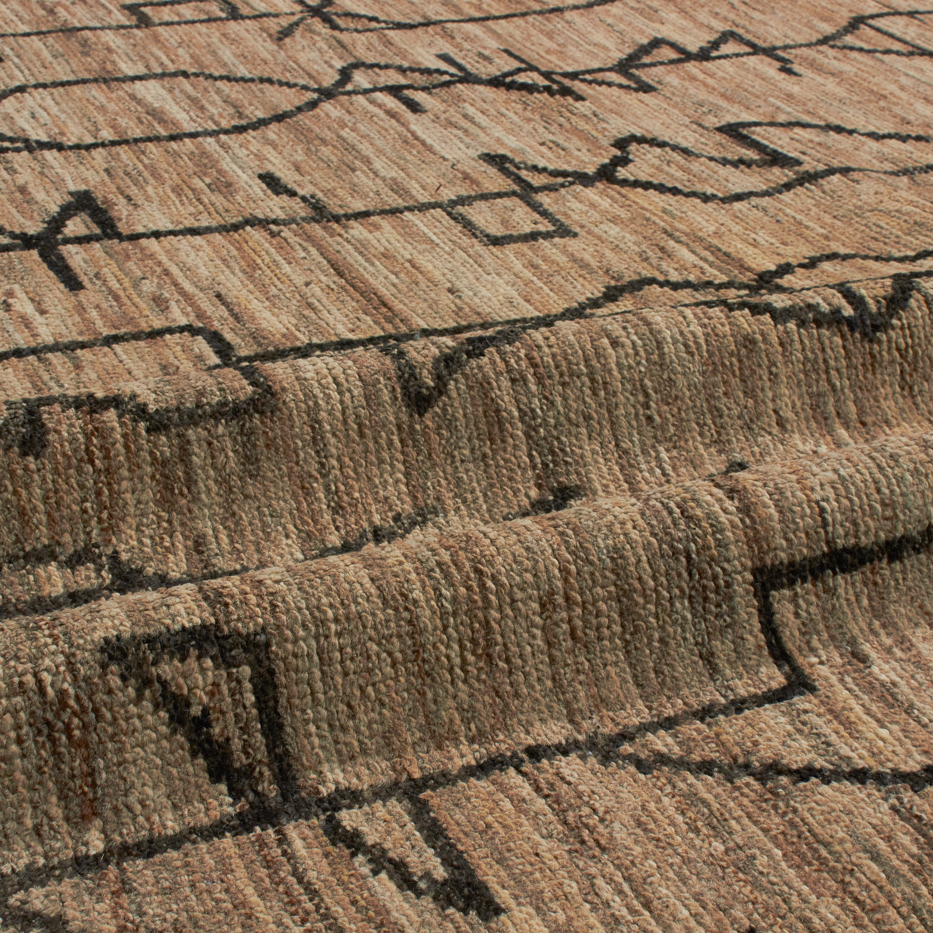 Revered for its lustre and soft hand, the natural qualities of wool from ancient Karakul sheep are honoured through restraint and refinement.