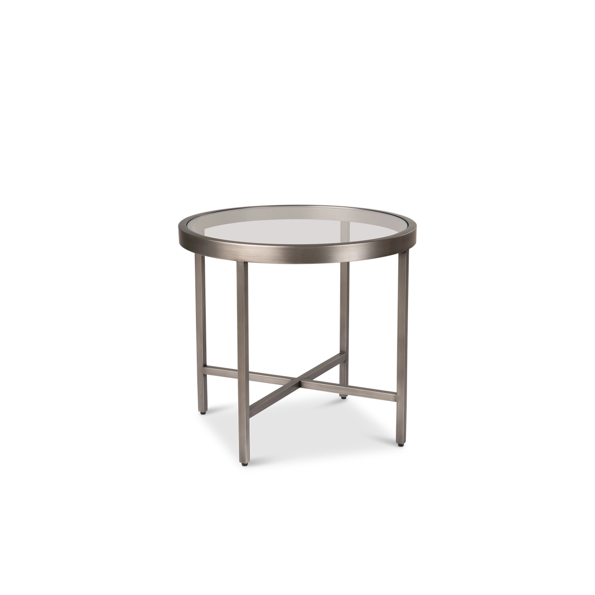 Tenor Side Table shown in an angled view in Aged Pewter, highlighting the round clear glass top, the slim brushed metal ring, and the crisscross stretcher between the legs.