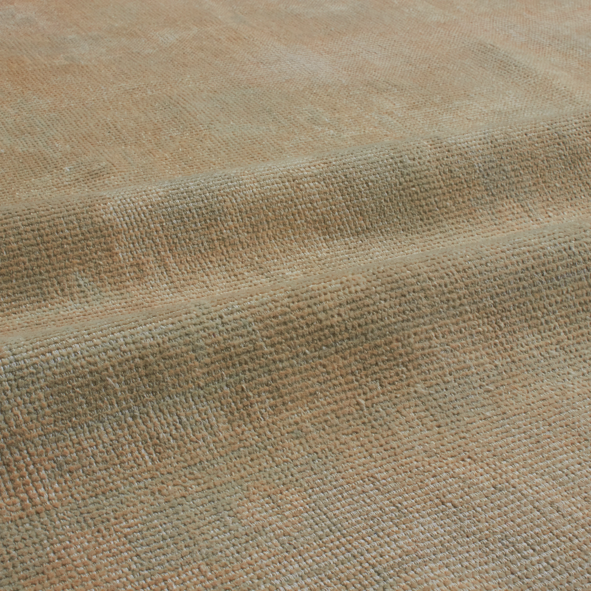 A close-up of woven fabric with a textured, basketweave-like pattern in warm beige and light brown tones.