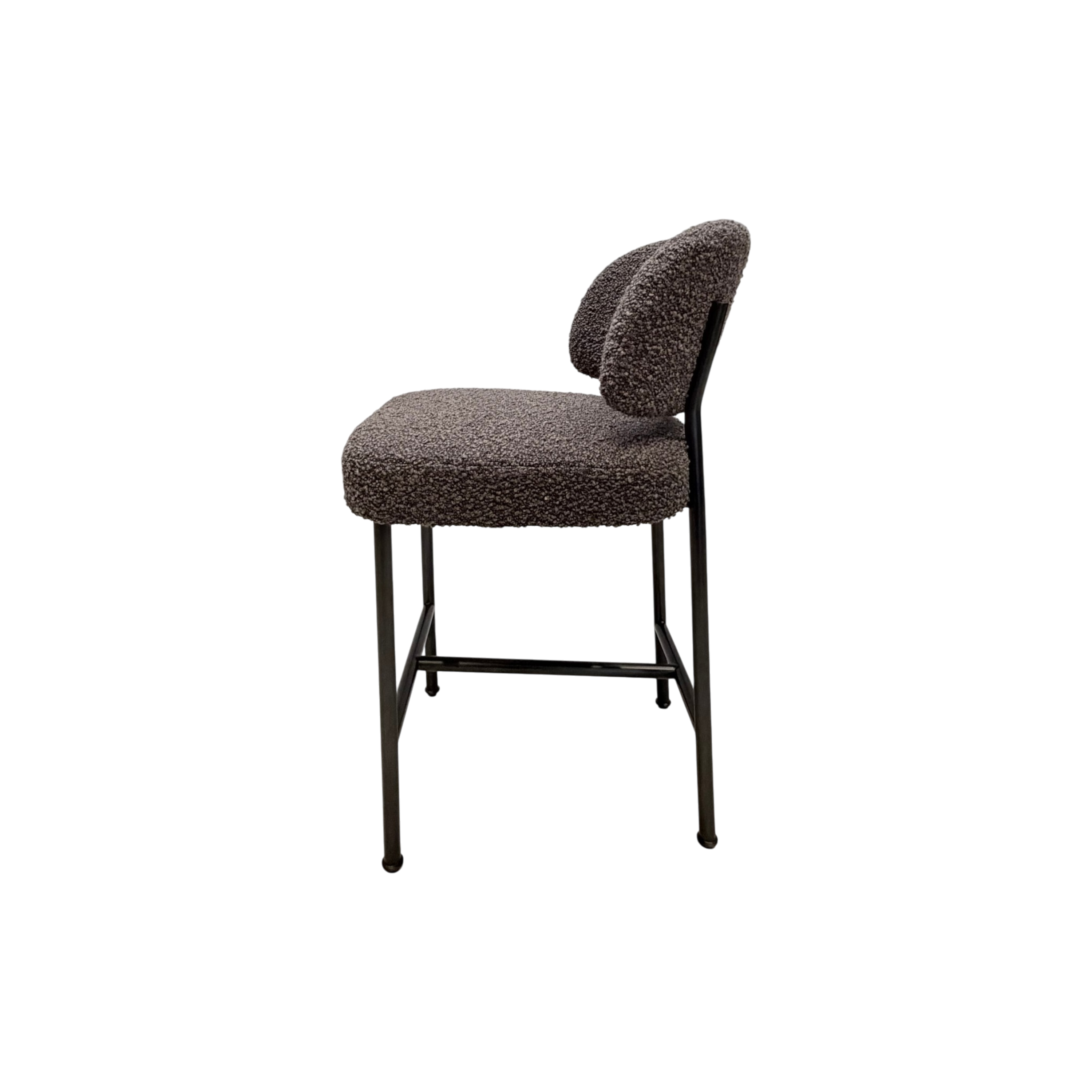 A modern bar stool with a textured, boucle-style upholstered seat and curved backrest, supported by a slim black metal frame, shown against a plain white background.