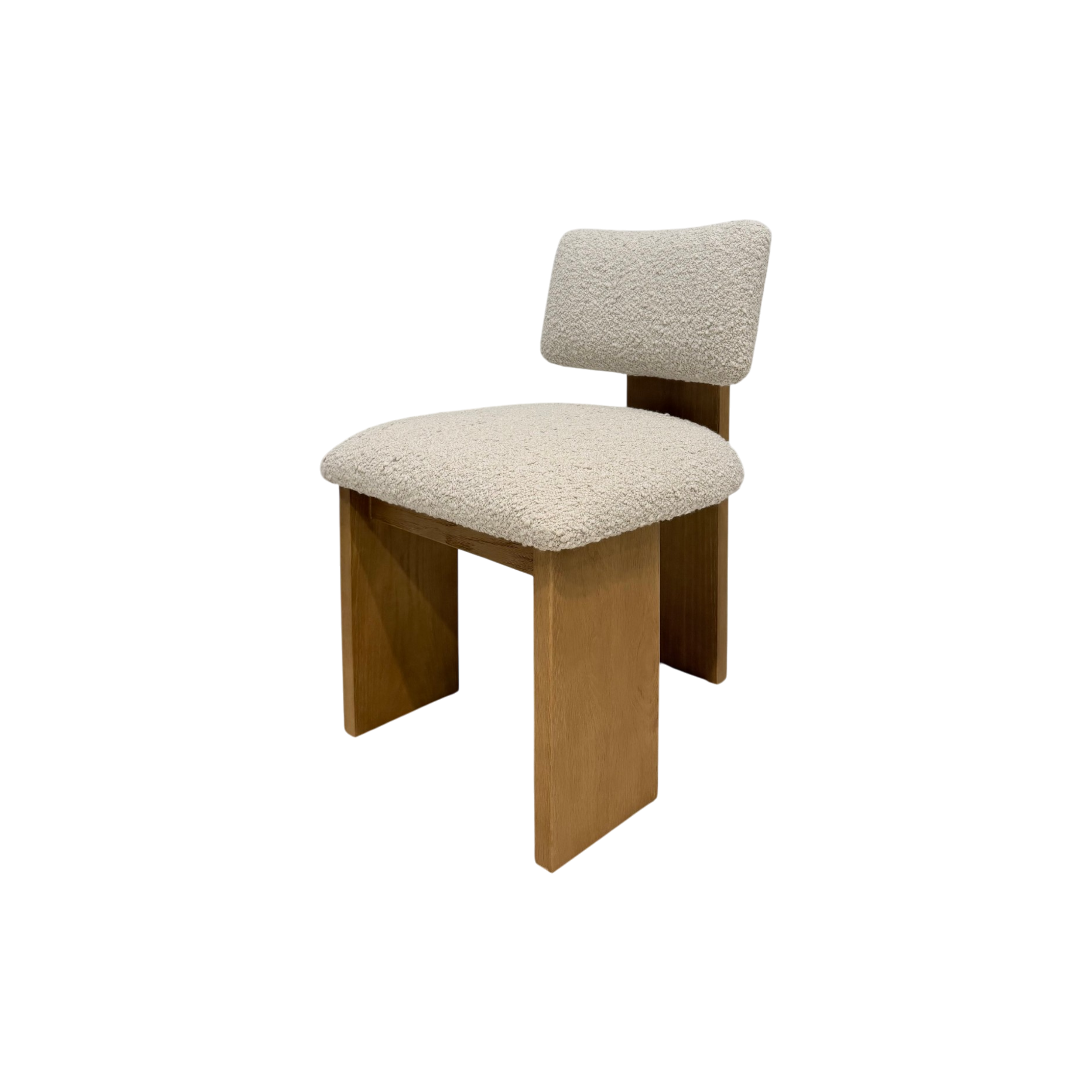 A mid-century modern wooden chair with a textured cream bouclé upholstered seat and backrest, shown against a plain white background.