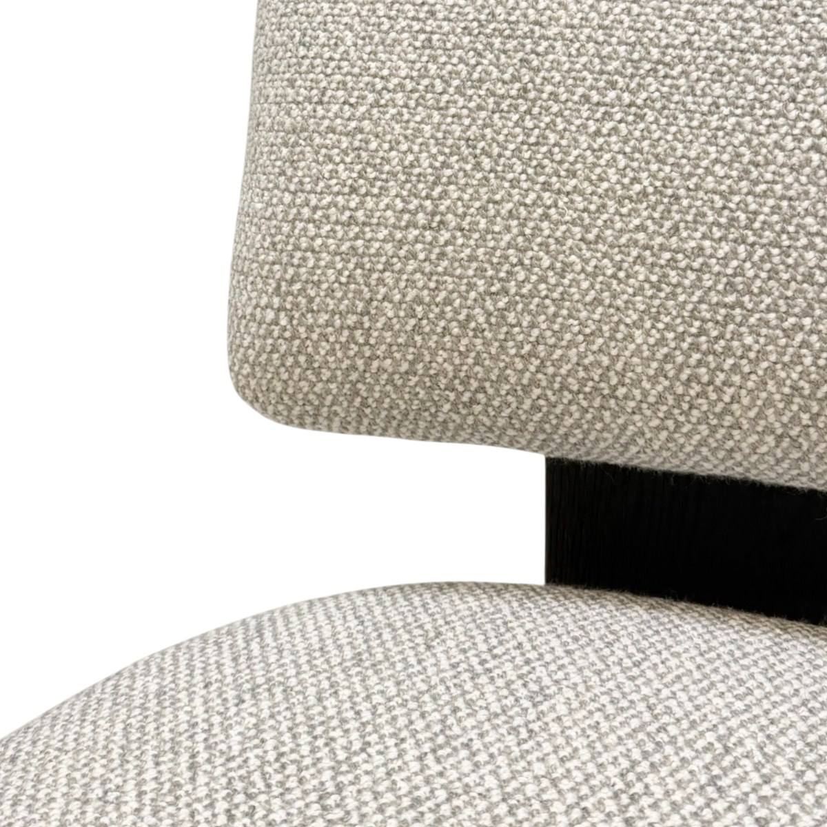 Giussano Dining Chair close-up showing textured ivory bouclé upholstery on the cushioned backrest and seat with dark wood frame detail.