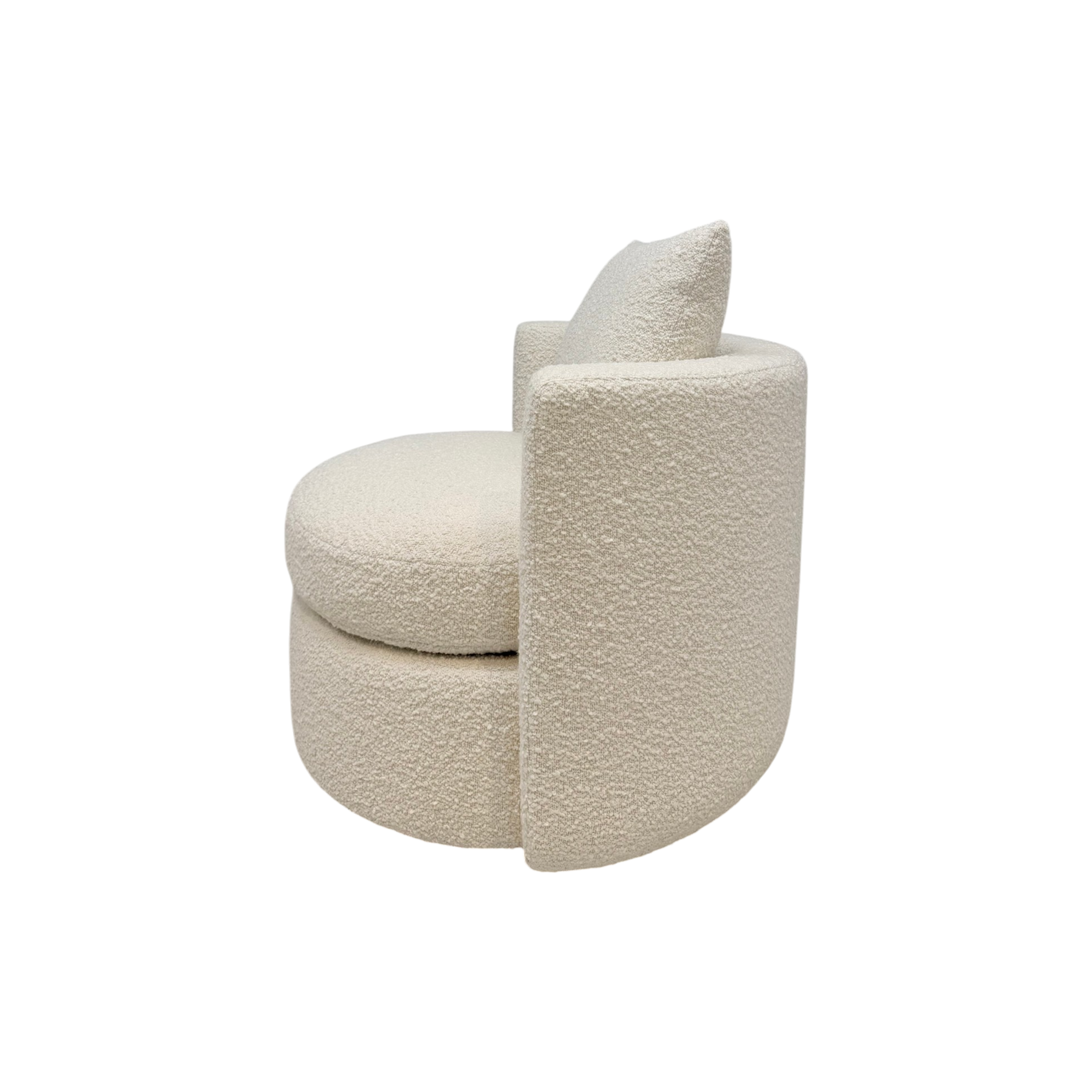Solenne Swivel Chair in textured ivory fabric, side view highlighting the curved swivel base and continuous upholstered side panel.