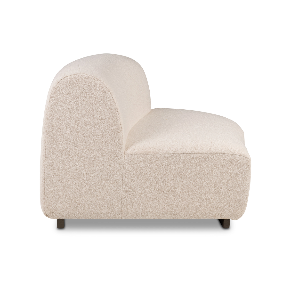 Rhine Modular RAF Chair in cream bouclé shown in side profile, with the rounded arm panel, the gently curved back, and the oatmeal-flecked texture clearly visible.