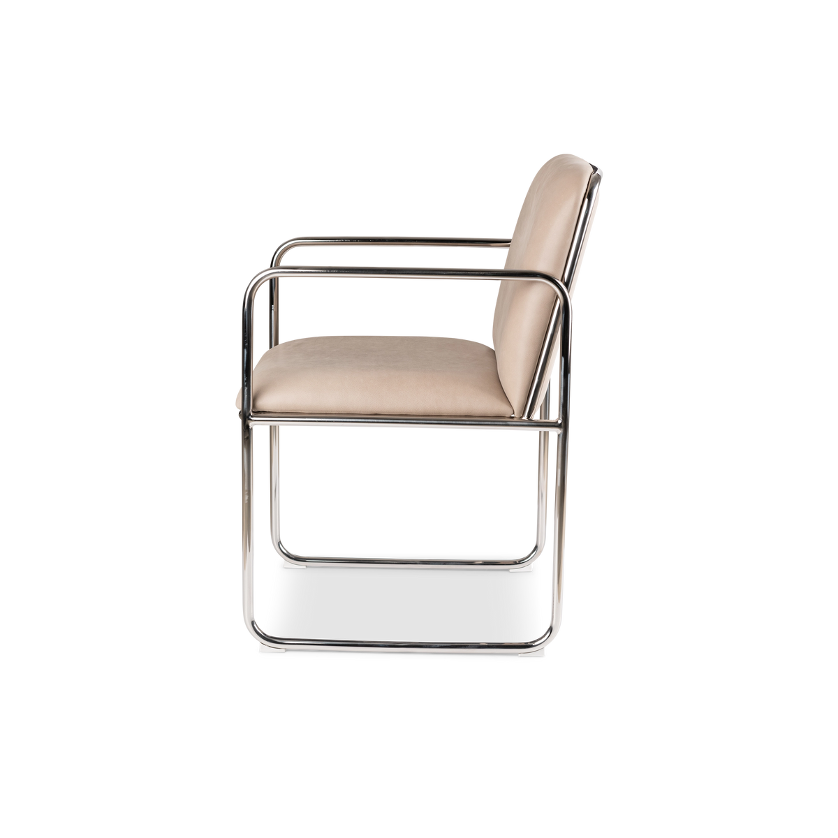 Rhodes Arm Chair shown from the side in taupe leather, with a looped steel arm, slightly reclined back, and continuous tubular legs.