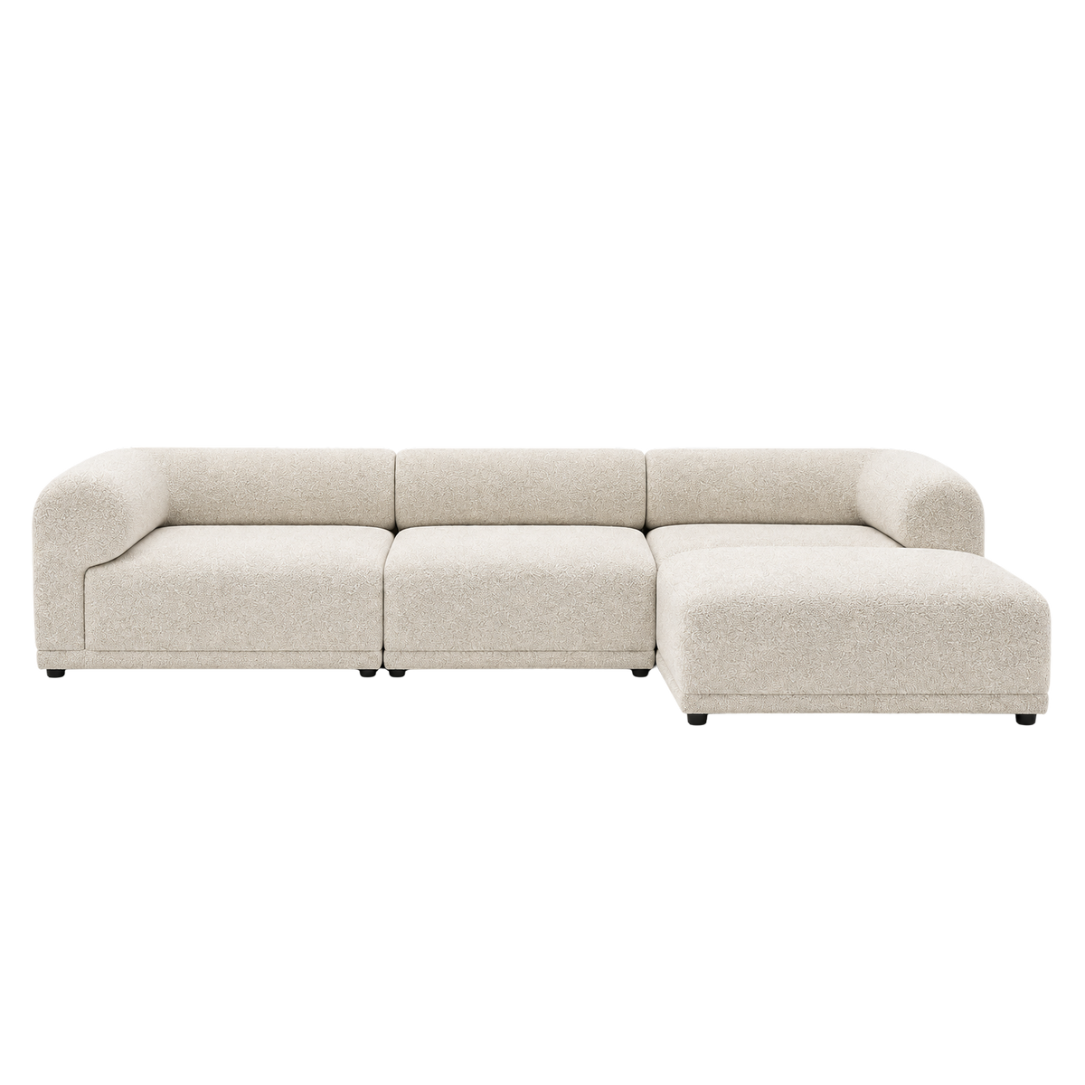 Capri Modular Sectional in off-white bouclé, front view showing the softly curved silhouette, rounded bolster-style arms, and deep seating.