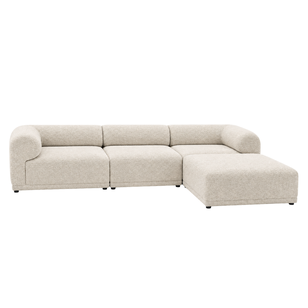 Capri Modular Sectional in off-white bouclé, angled view highlighting the sculptural curve and chaise return.