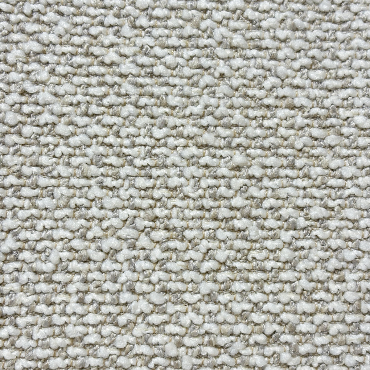 Tempo Modular Sectional fabric, extreme close-up showing the heathered greige weave with chunky, lighter yarns over a softer base and deeper flecks between them.