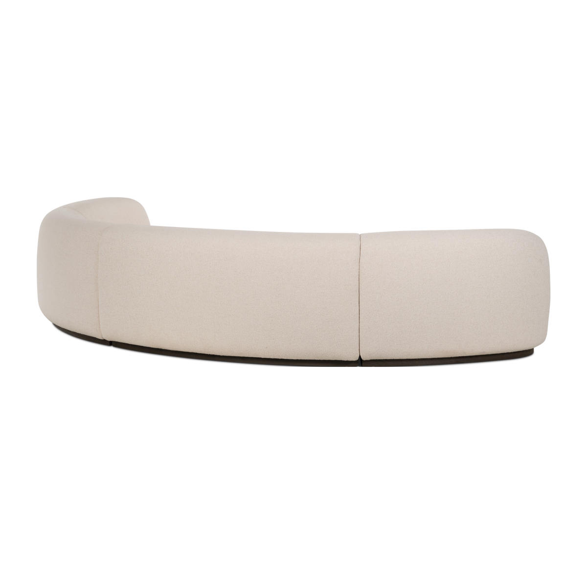 Rhine Modular Sectional Sofa shown from the back in cream bouclé upholstery, highlighting the sweeping curved back, the seams between sections, and the dark base following the arc.