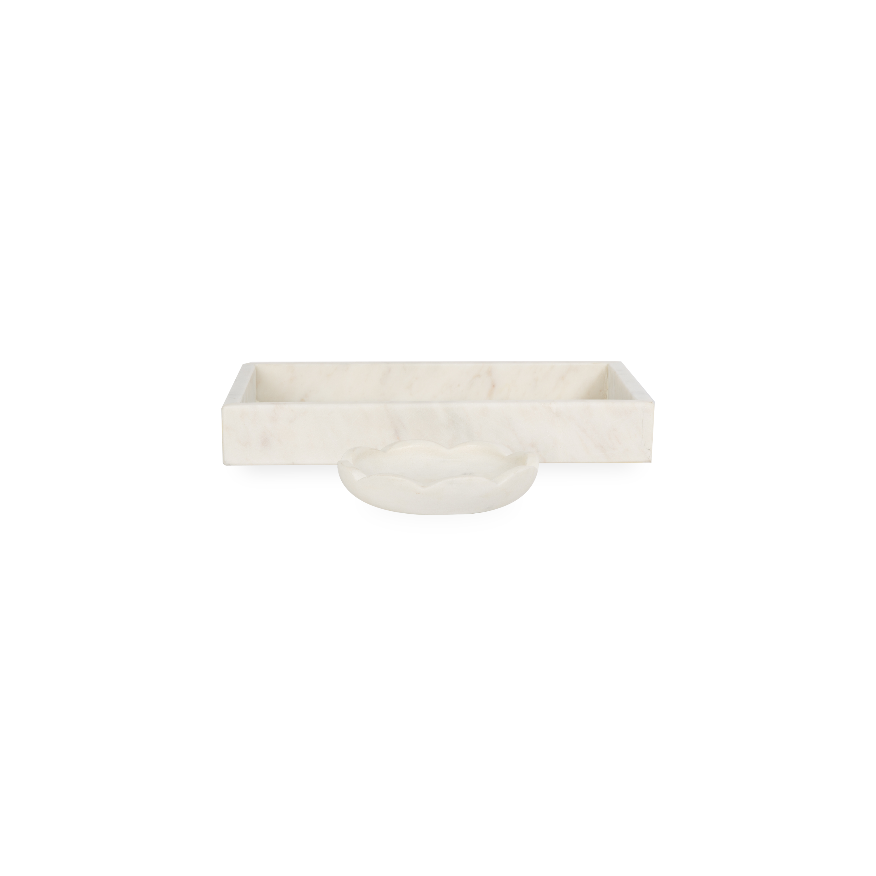 A collection of solid marble countertop pieces with a matte finish.