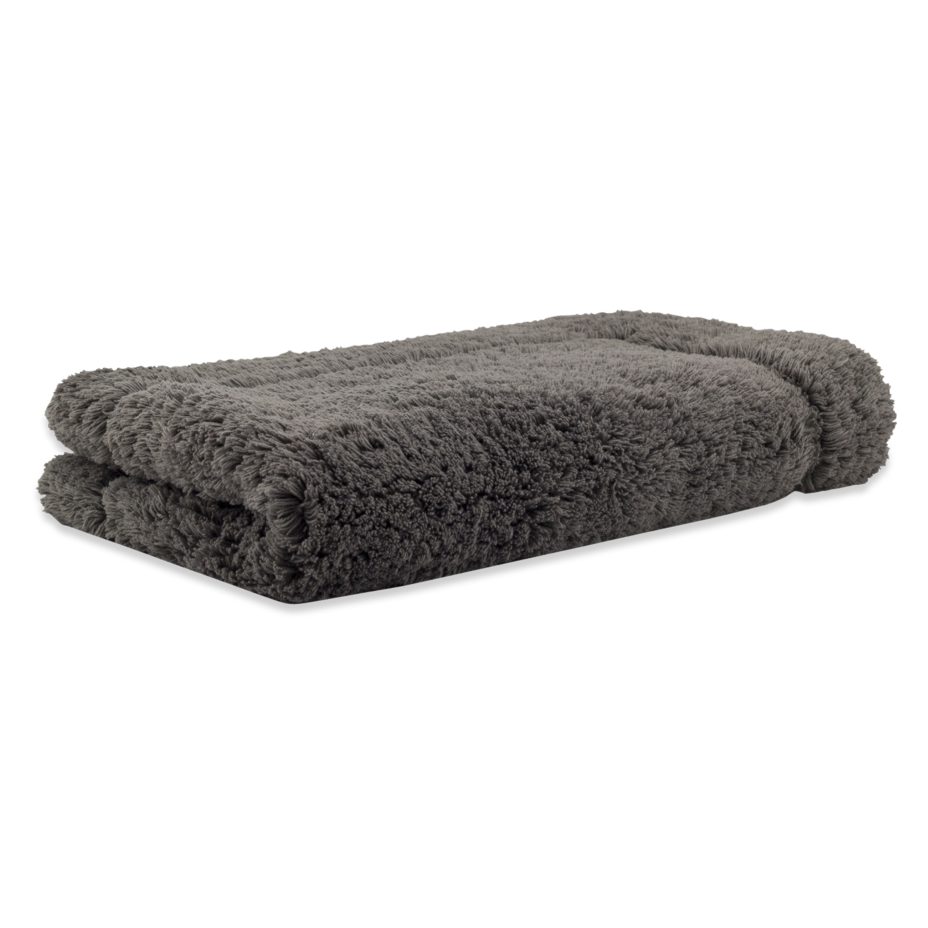 Crafted in a century-old mill in Portugal, this 100% cotton bath rug is fully reversible.