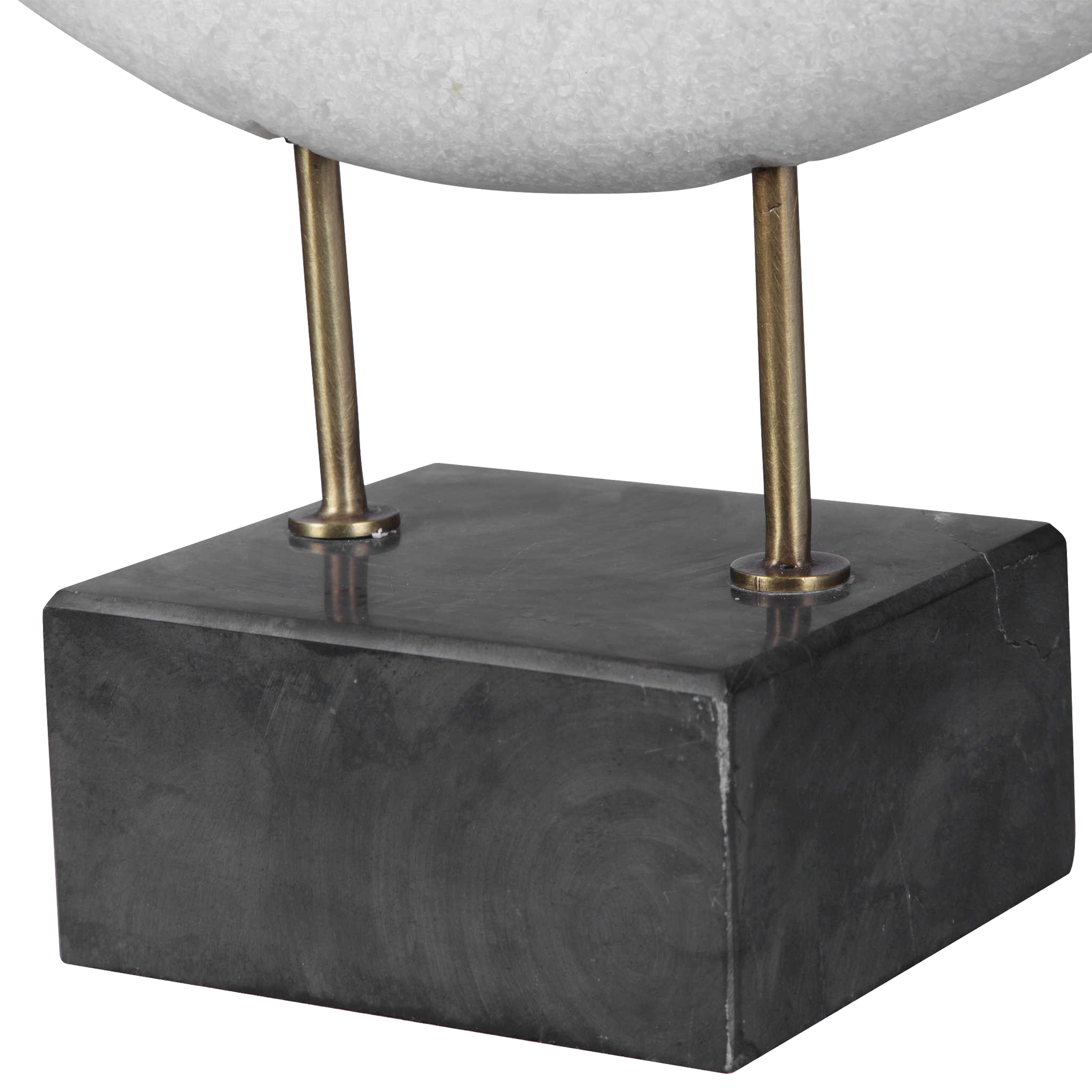 The monolithium shape executed in granulated marble that accurately replicates the look of Thassos marble with a honed black marble base and brass pegs is bound to become a highly