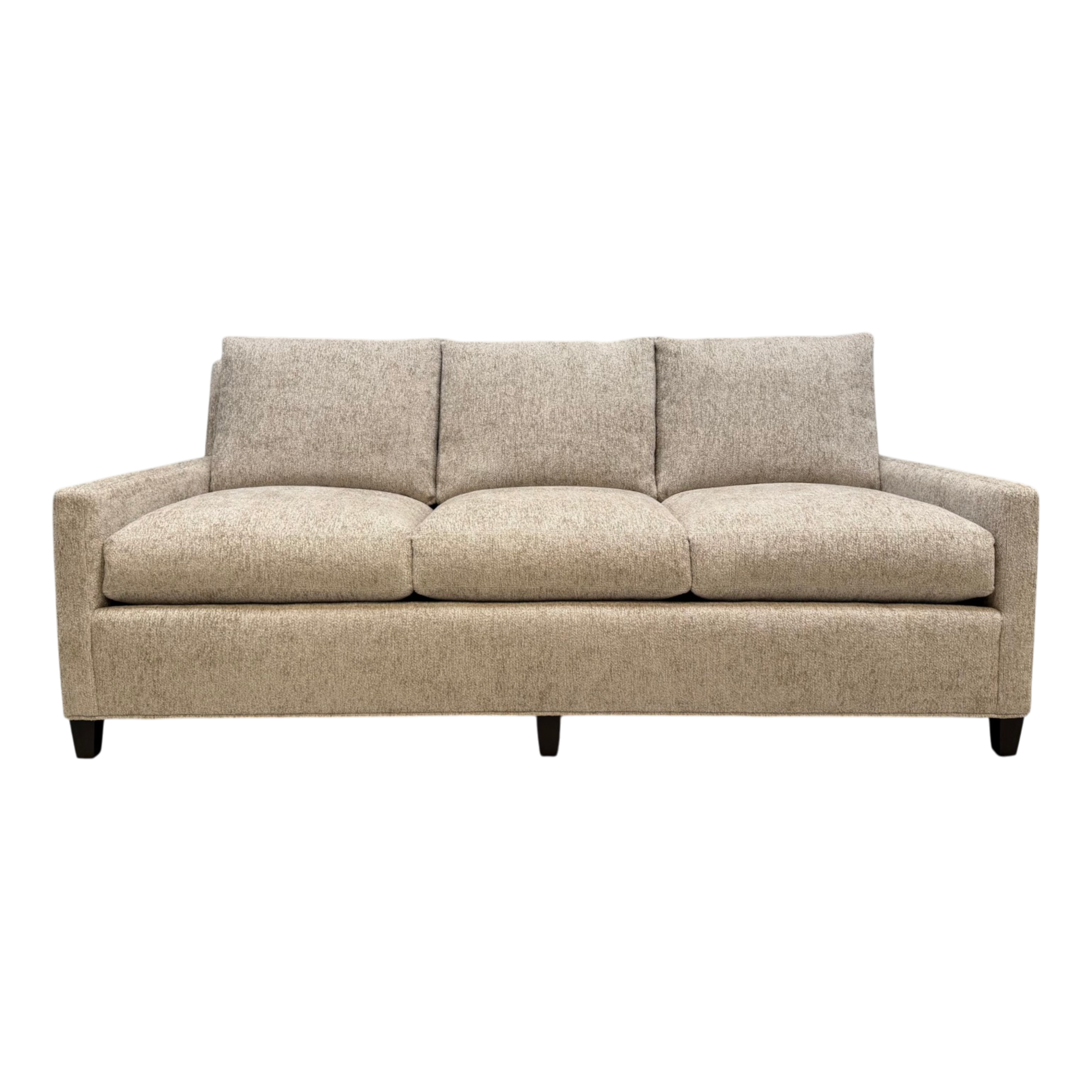 Front view of the Weston Sofa upholstered in Foundry Sand chenille, with three plush seat and back cushions, slim track arms and dark tapered legs.