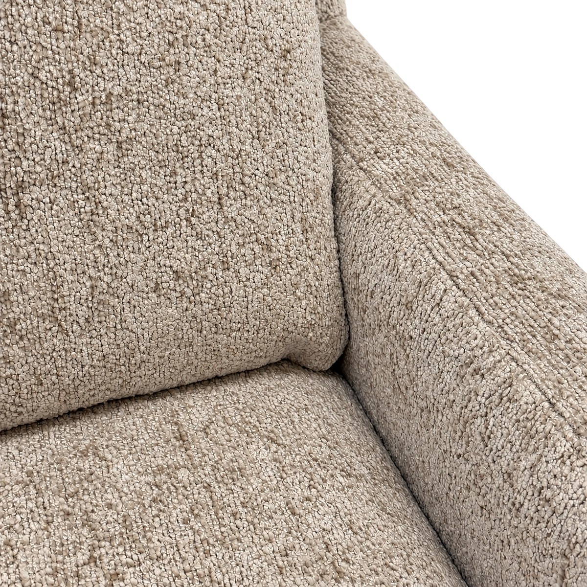 Weston Sofa close-up showing the nubby Foundry Sand chenille where two back cushions meet the track arm, with fine piped seams.