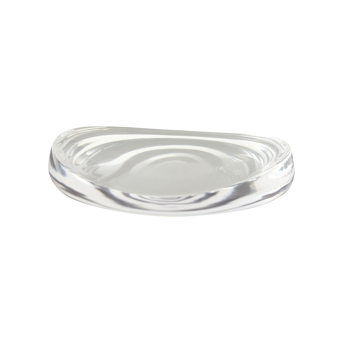 Clear Dune Bowl Small with a shallow asymmetrical form, thick transparent walls and softly rounded organic contours.