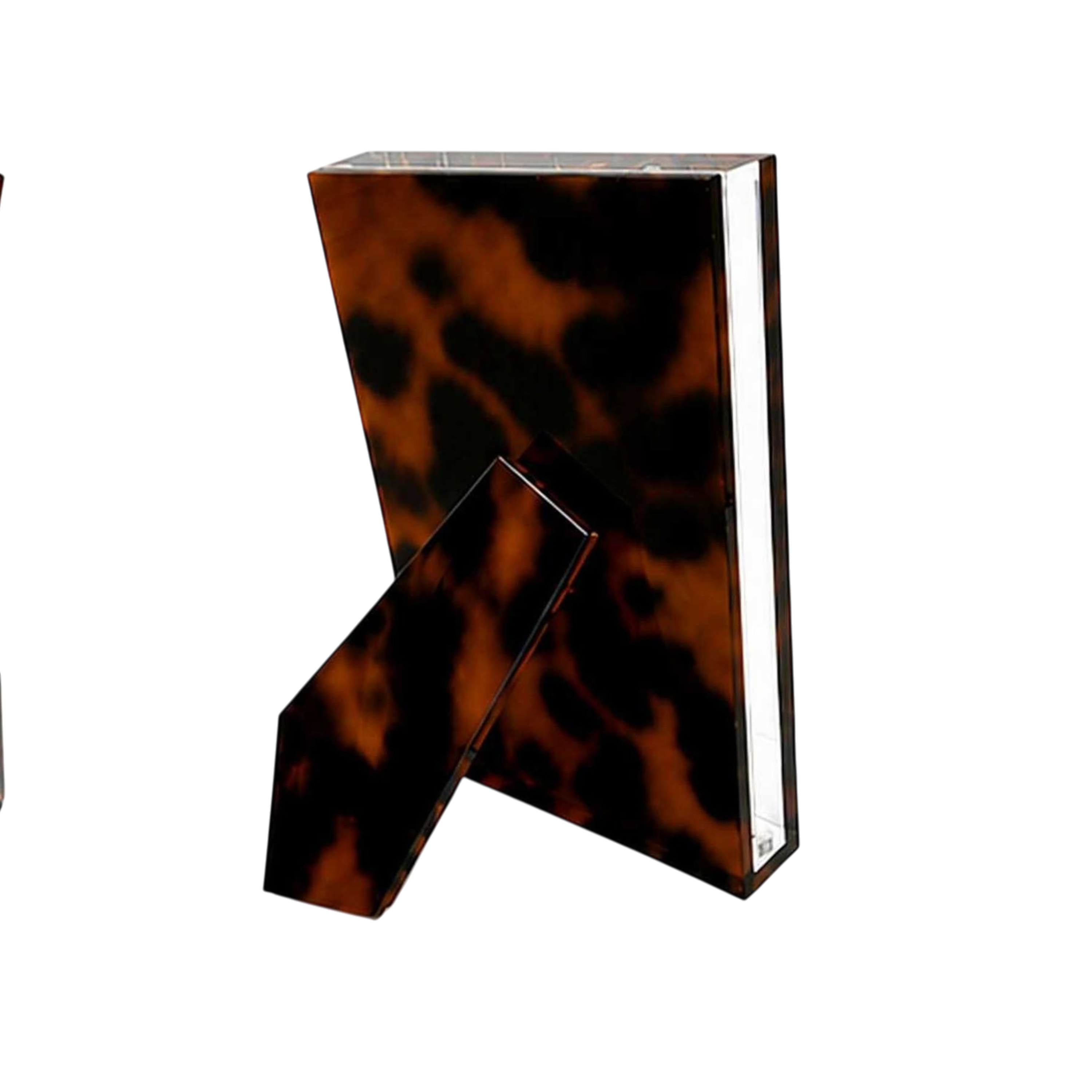 Acrylic Photo Frame 5x7 in tortoiseshell-patterned Lucite shown from the back with a matching angled easel stand and clear beveled edges.