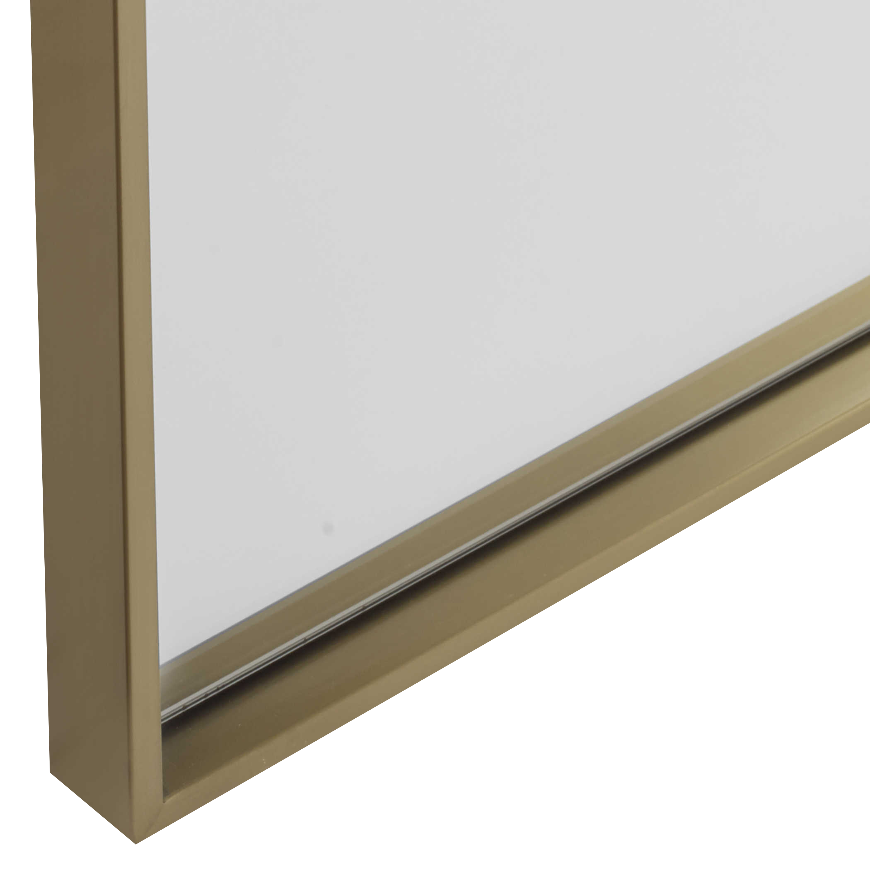 The Gallery Floor Mirror features a slim stainless steel frame that is finished in a light plated brushed brass.