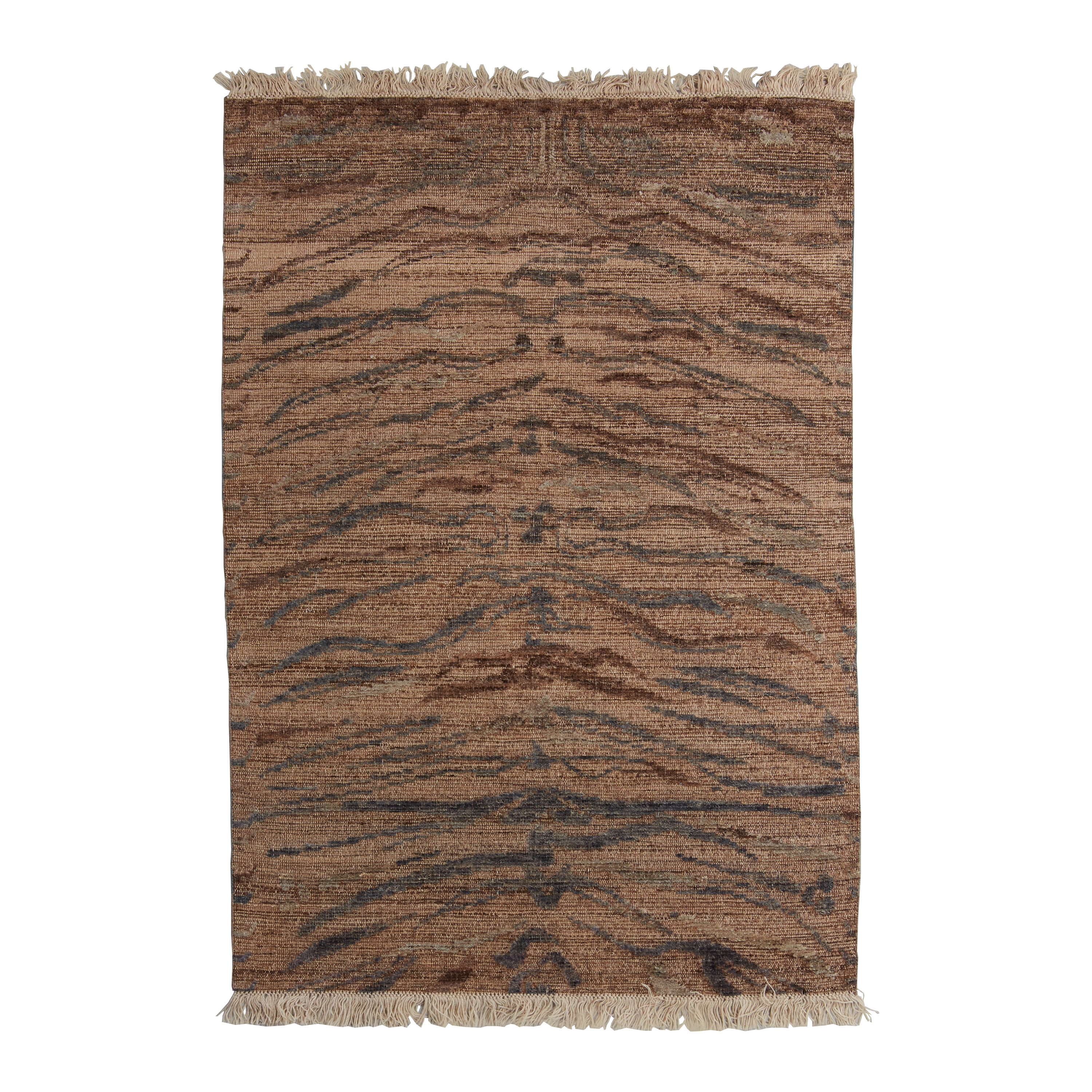 A rectangular woven rug with a natural brown and beige base, featuring a dark charcoal gray tiger-stripe pattern and cream-colored fringe on both ends, shown against a plain white background.