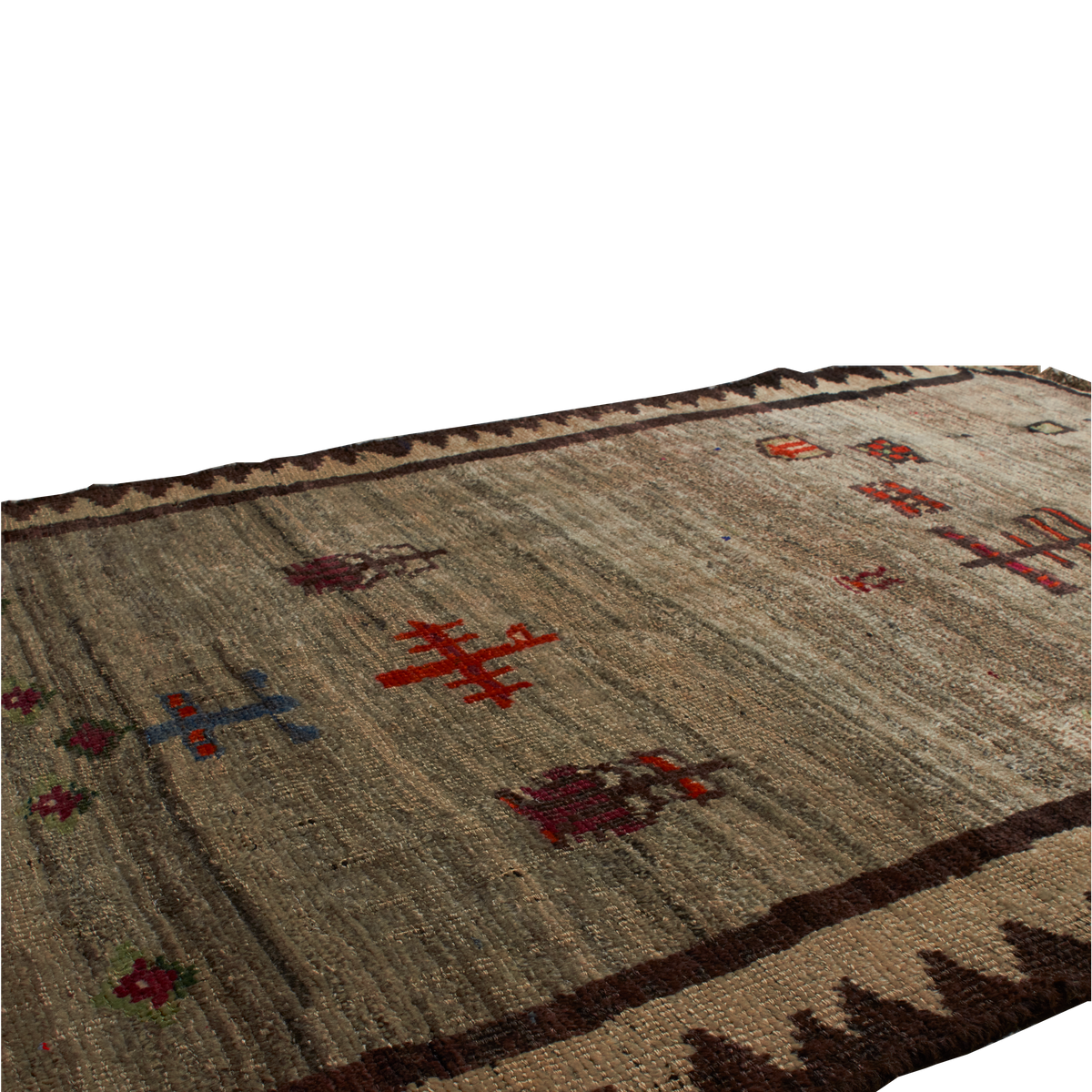 A flatweave kilim rug with a textured beige and brown base, decorated with red, blue, and green geometric and floral motifs, shown on a plain white background.