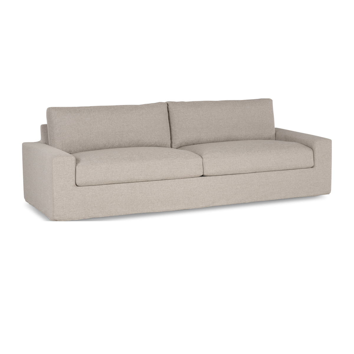 Angled view highlighting the deep seat cushions, low square arms, and clean base of the Montara Sofa in Pumice woven fabric.