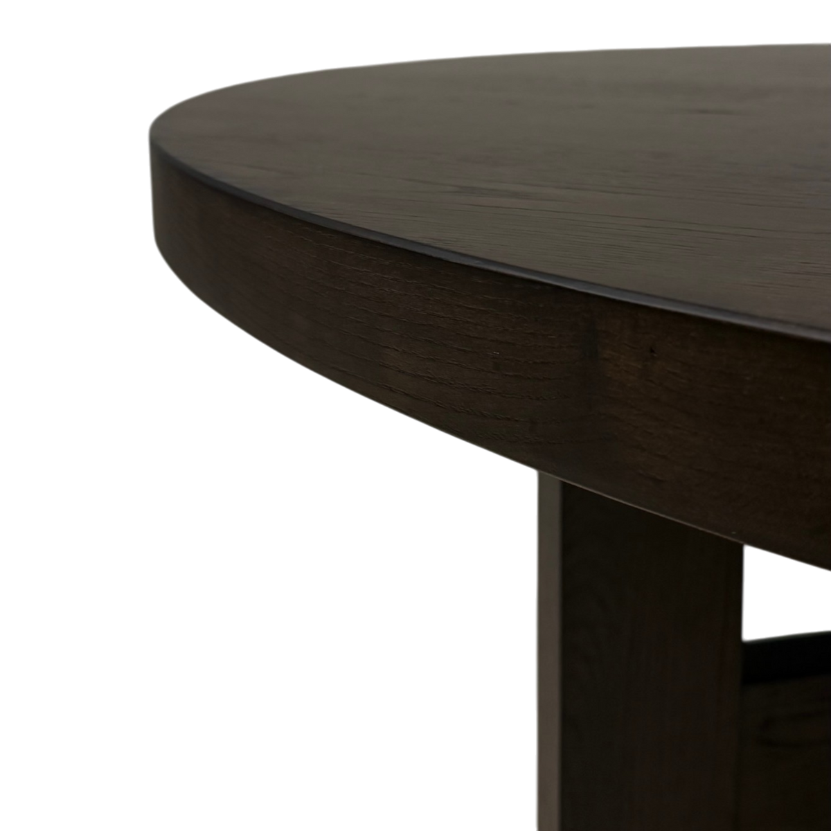 Close-up of Chino Dining Table showing the rounded tabletop edge, smoked ash grain and square leg construction.