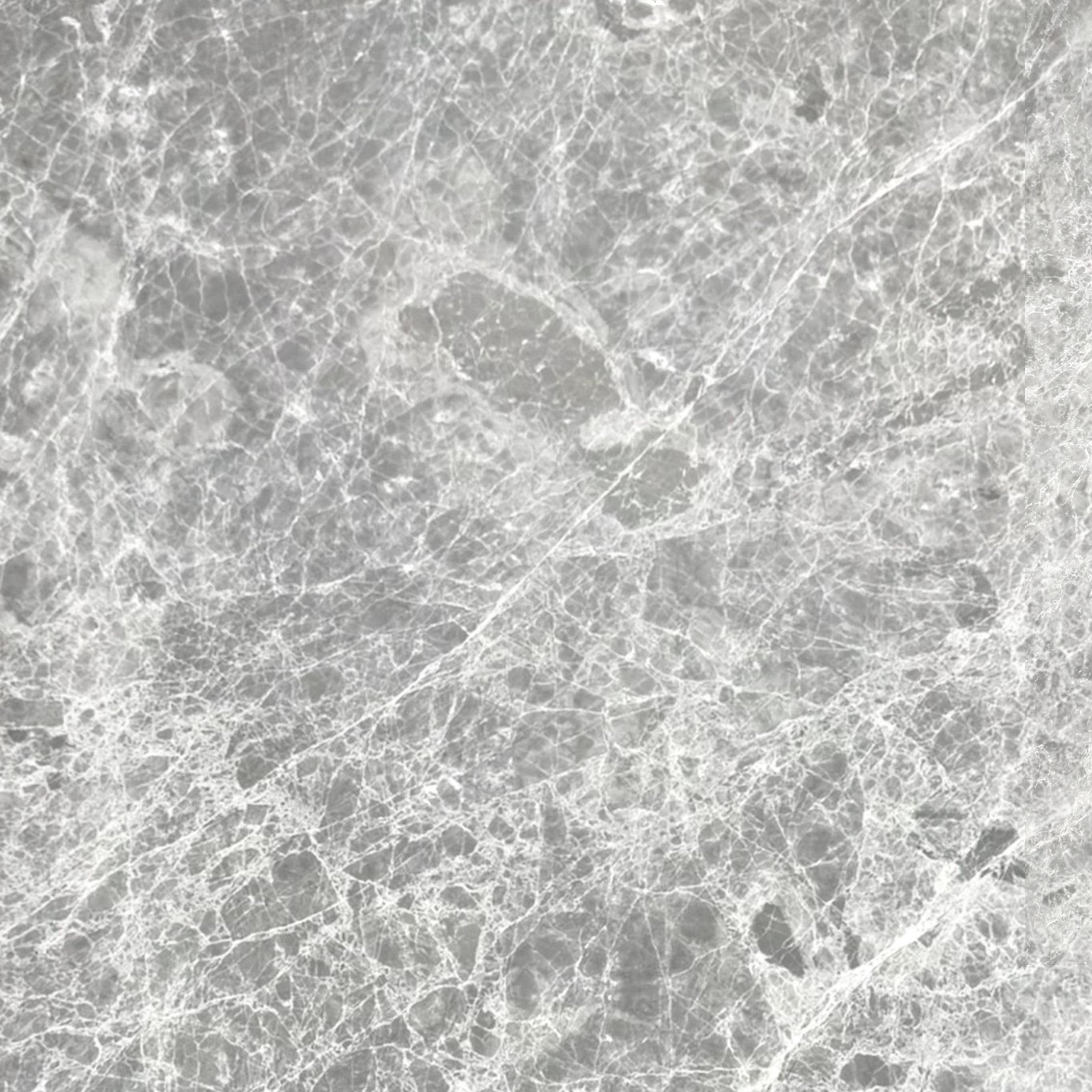 Close-up of the grey stone surface, showing intricate white veining and layered tonal variation