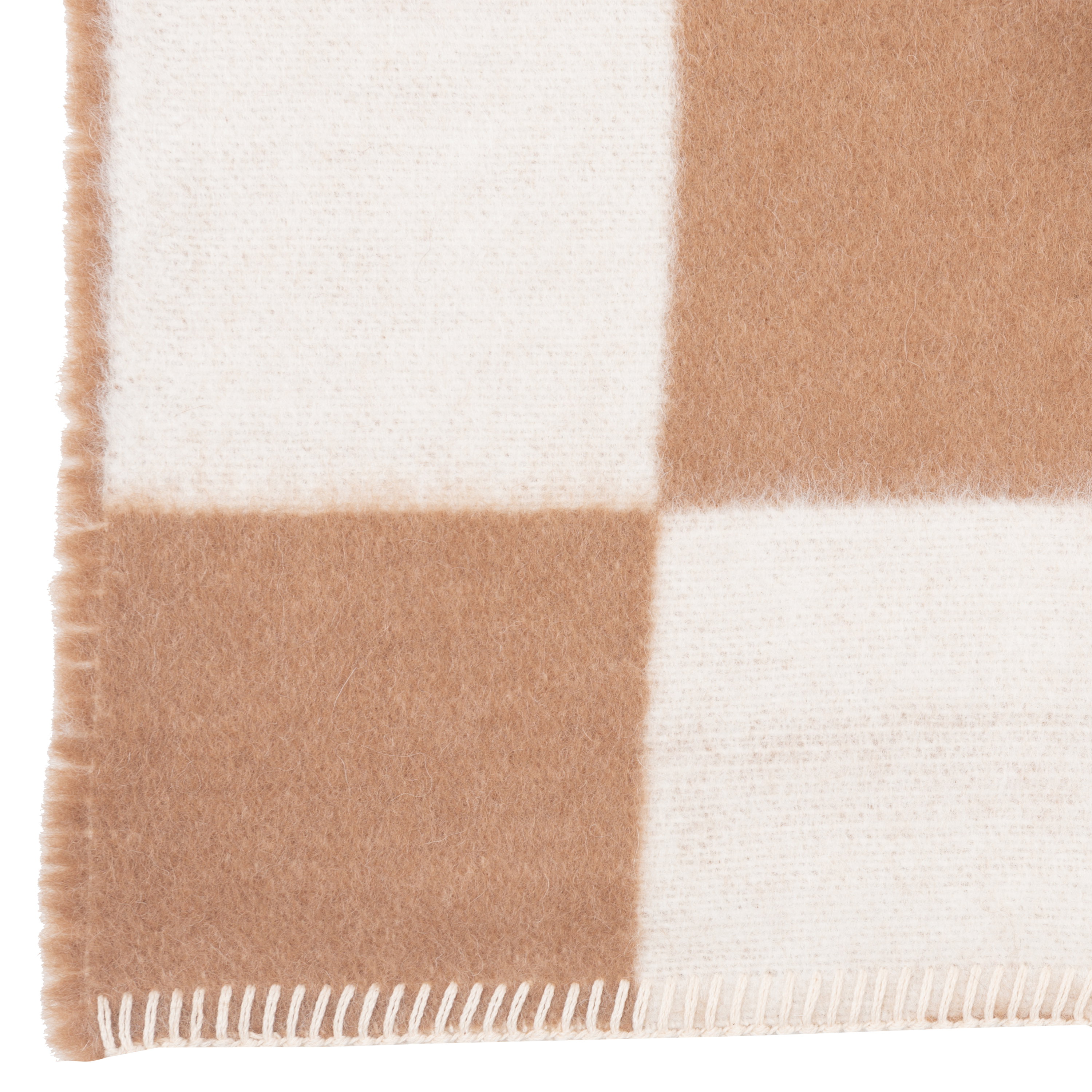 Presenting a luxuriously soft texture, the Crosby Check Throw is woven with natural superfine alpaca wool and undyed Peruvian cotton.