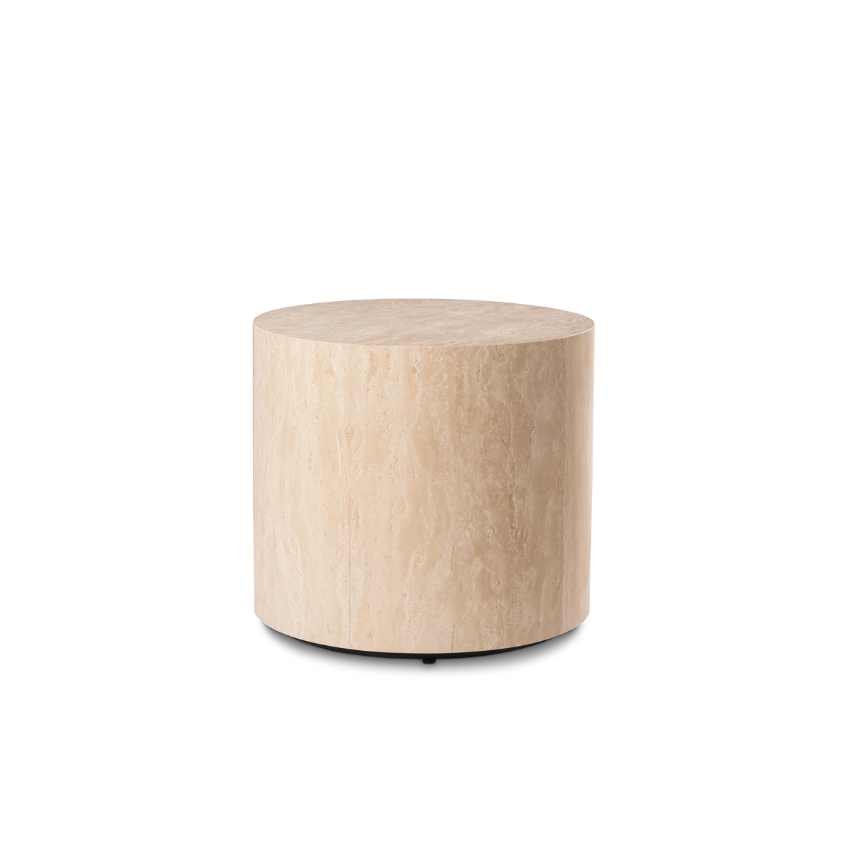 Meta Round Side Table shown from a slightly elevated angle in Warm Beige travertine, highlighting the honed top and the vertical veining running down the curved side.