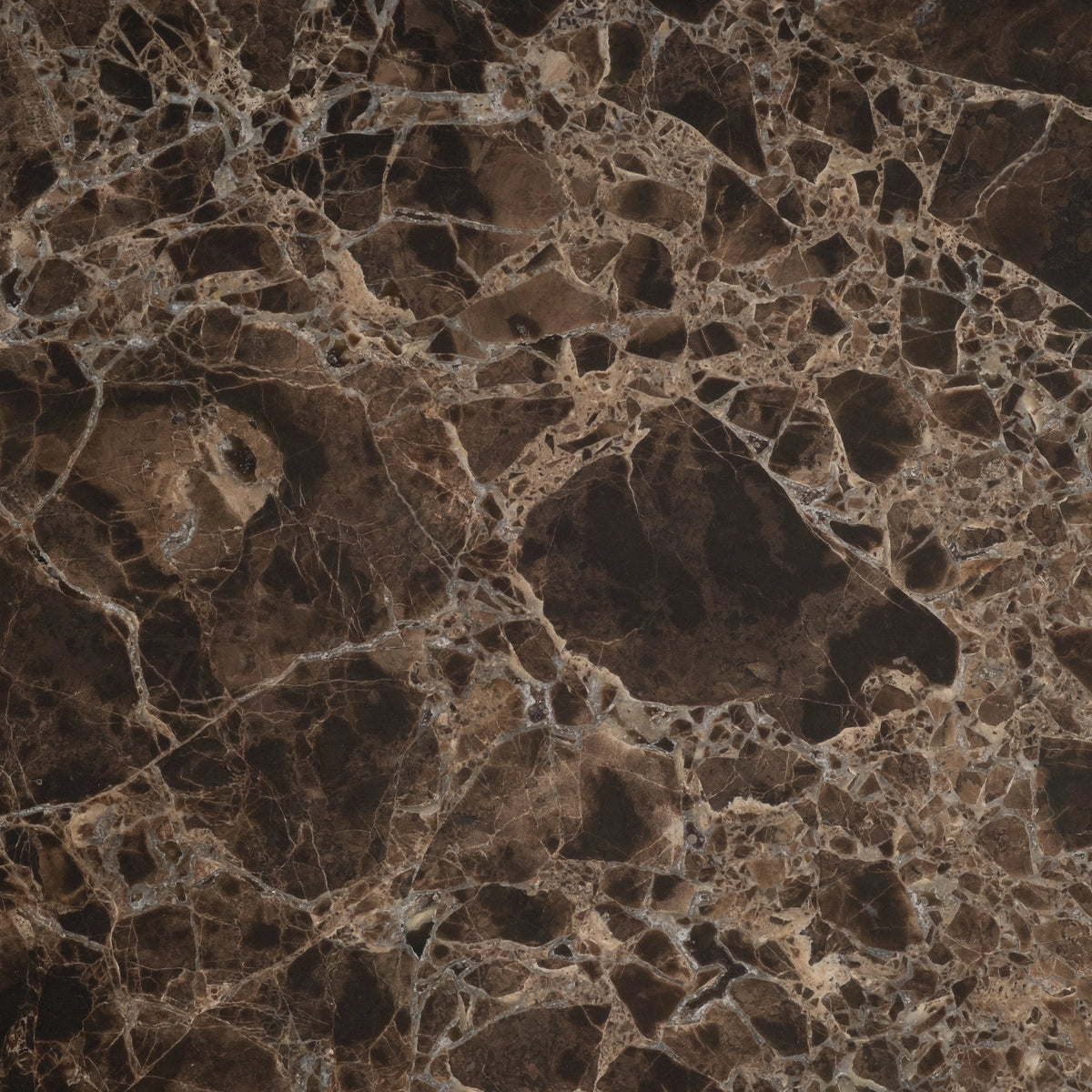 Close-up showing the Chocolate Brown Dark Emperador marble surface of the Meta Rectangular Coffee Table, with dark brown stone clusters framed by fine pale grey and tan veins.