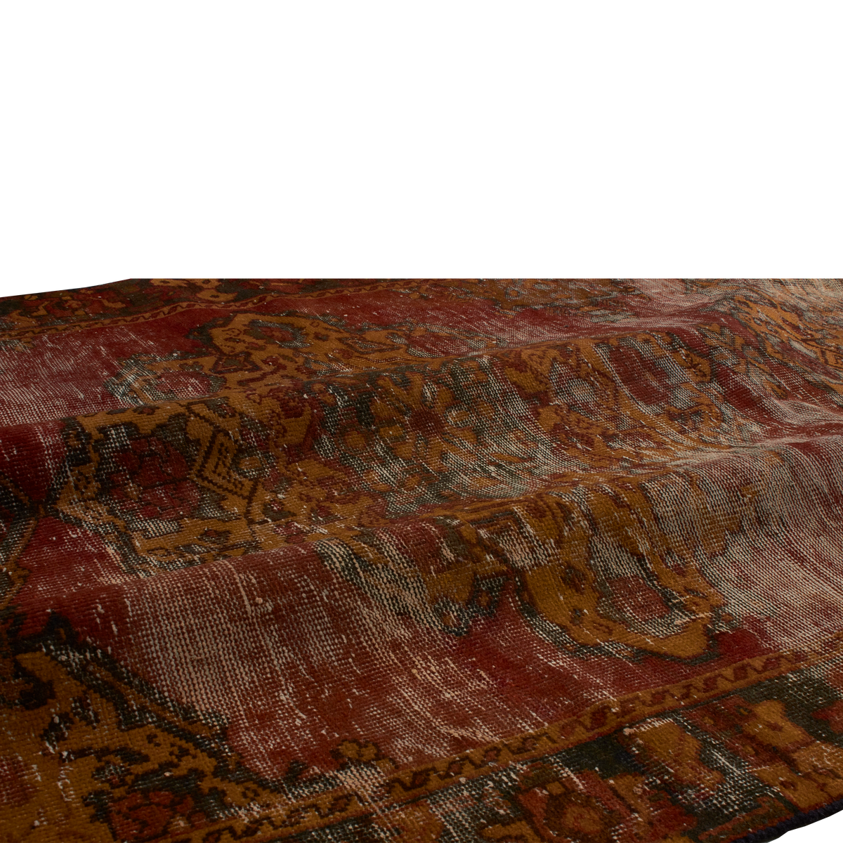 Rolled up vintage rug