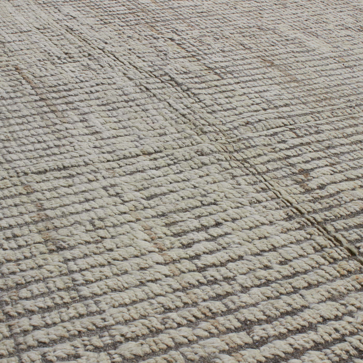 Revered for its lustre and soft hand, the natural qualities of wool from ancient Karakul sheep are honoured through restraint and refinement.