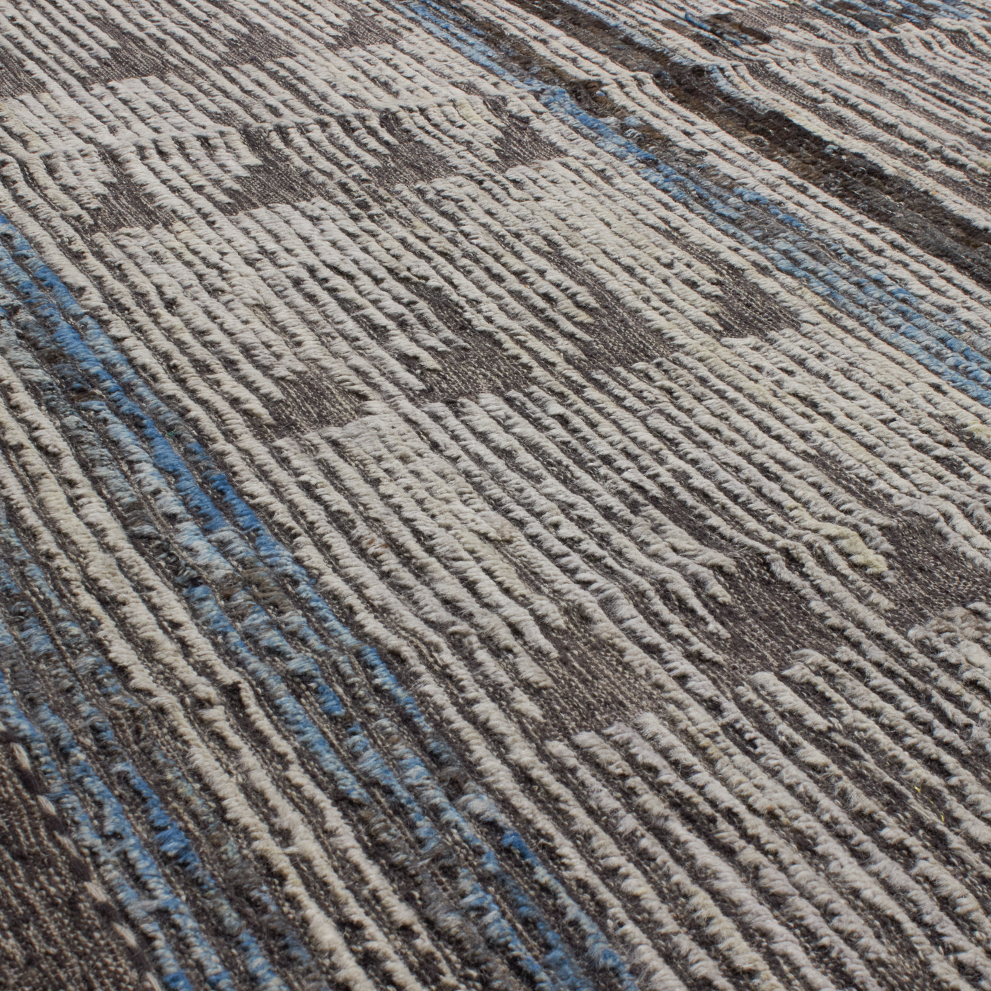 Revered for its lustre and soft hand, the natural qualities of wool from ancient Karakul sheep are honoured through restraint and refinement.