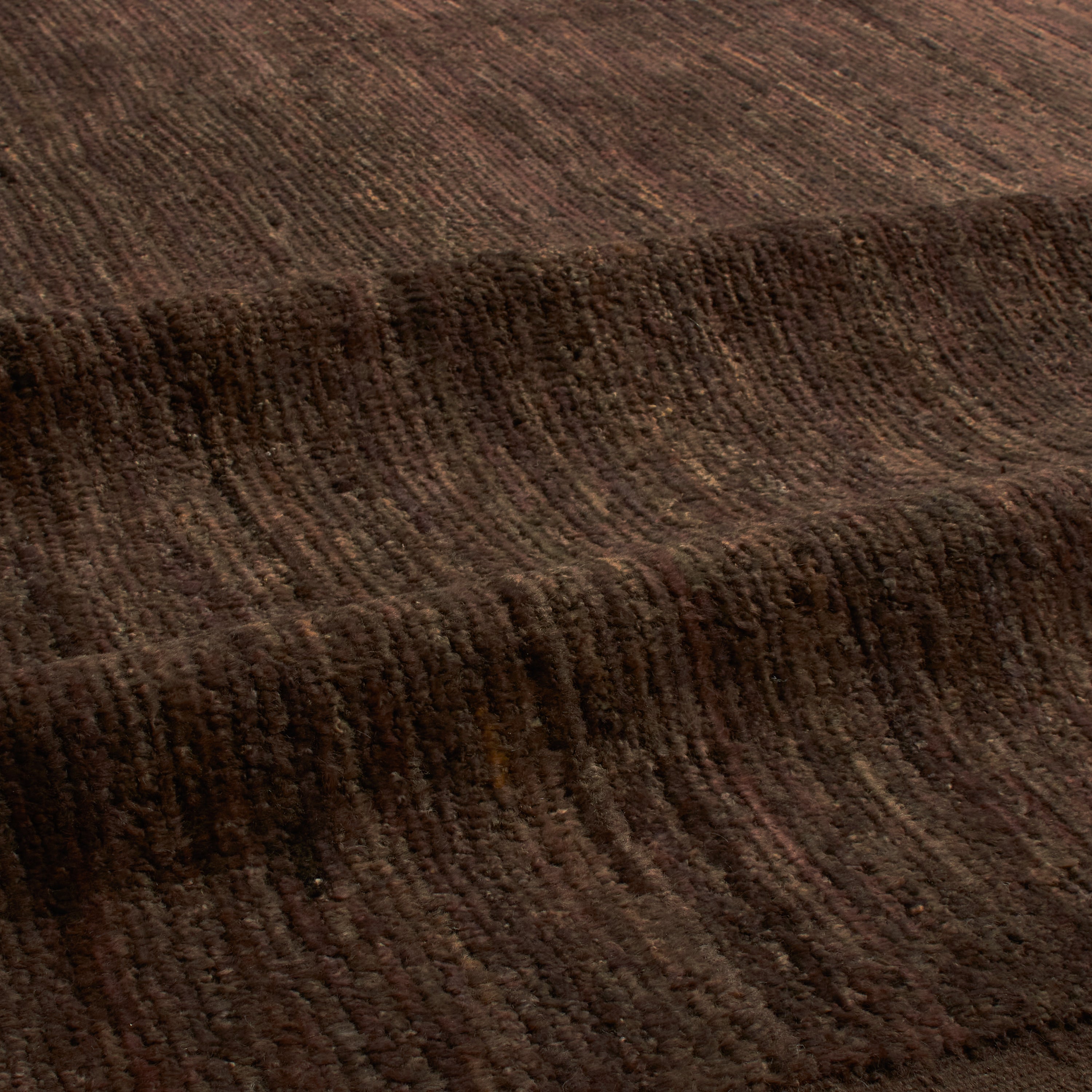 Revered for its lustre and soft hand, the natural qualities of wool from ancient Karakul sheep are honoured through restraint and refinement.