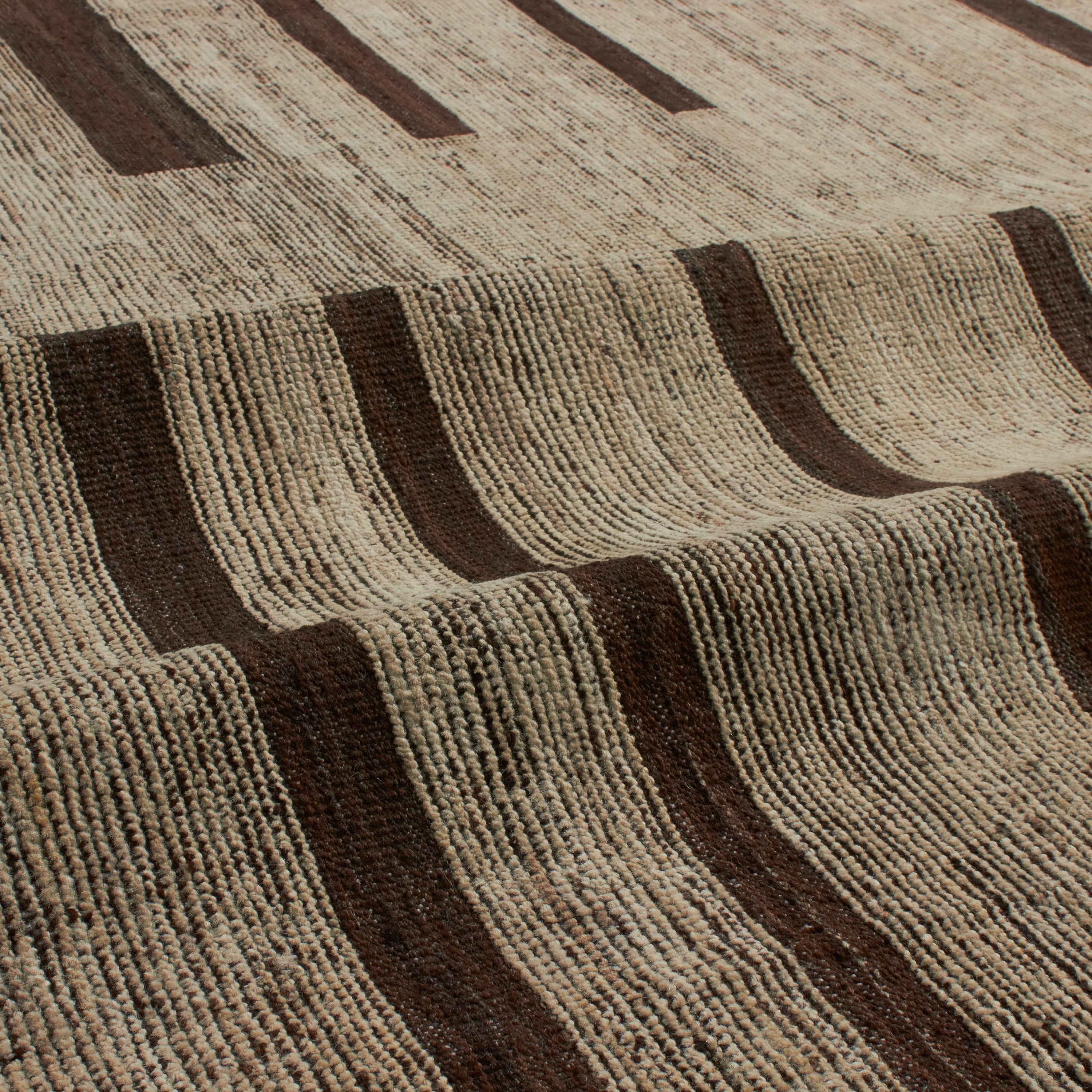 Revered for its lustre and soft hand, the natural qualities of wool from ancient Karakul sheep are honoured through restraint and refinement.