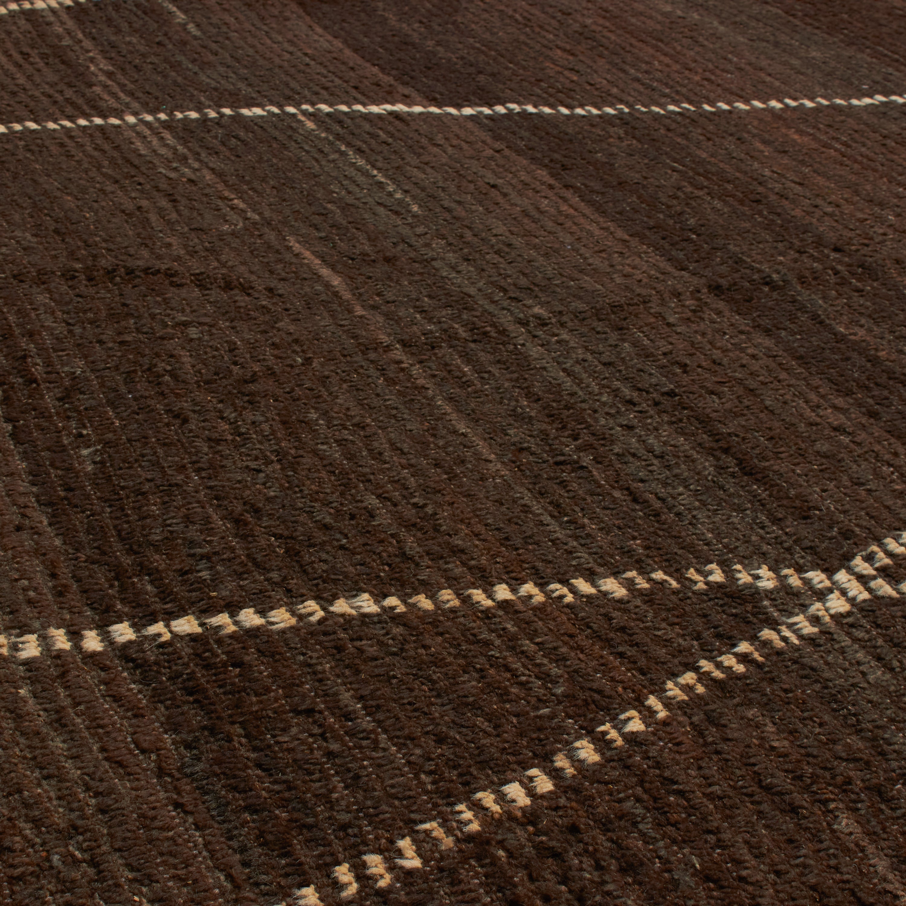 Revered for its lustre and soft hand, the natural qualities of wool from ancient Karakul sheep are honoured through restraint and refinement.