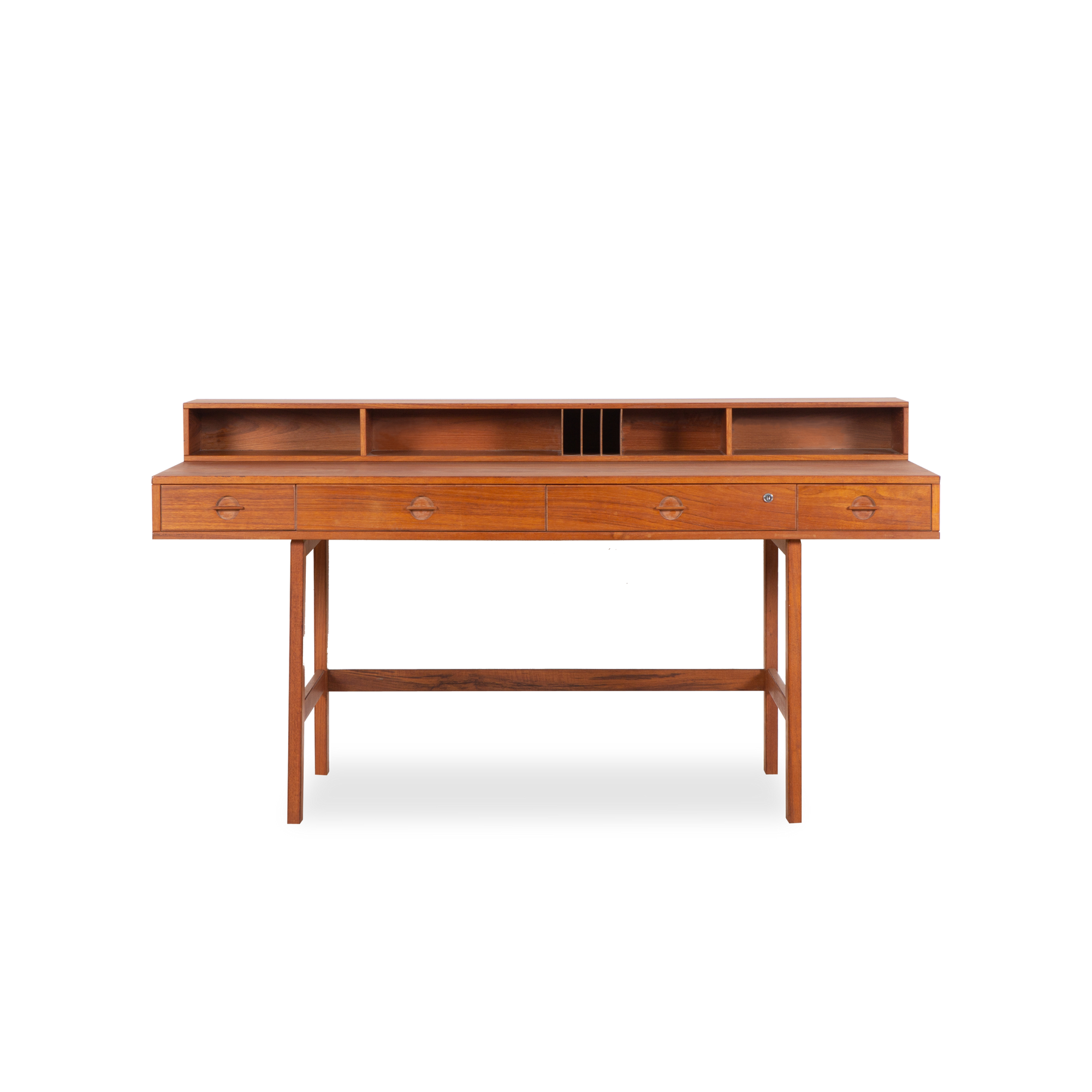A stunning display of aged teak wood, this vintage Desk was designed by Peter Løvig Nielsen and manufactured by Løvig Dansk Design, circa 1960s.