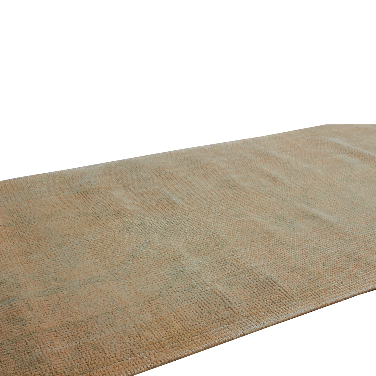 A close-up of a woven runner rug in a warm tan and beige color, showing its textured, braided pattern against a solid white background.