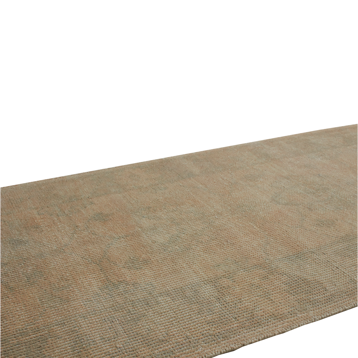 A close-up of a woven rug or textile shown at an angle against a plain white background.