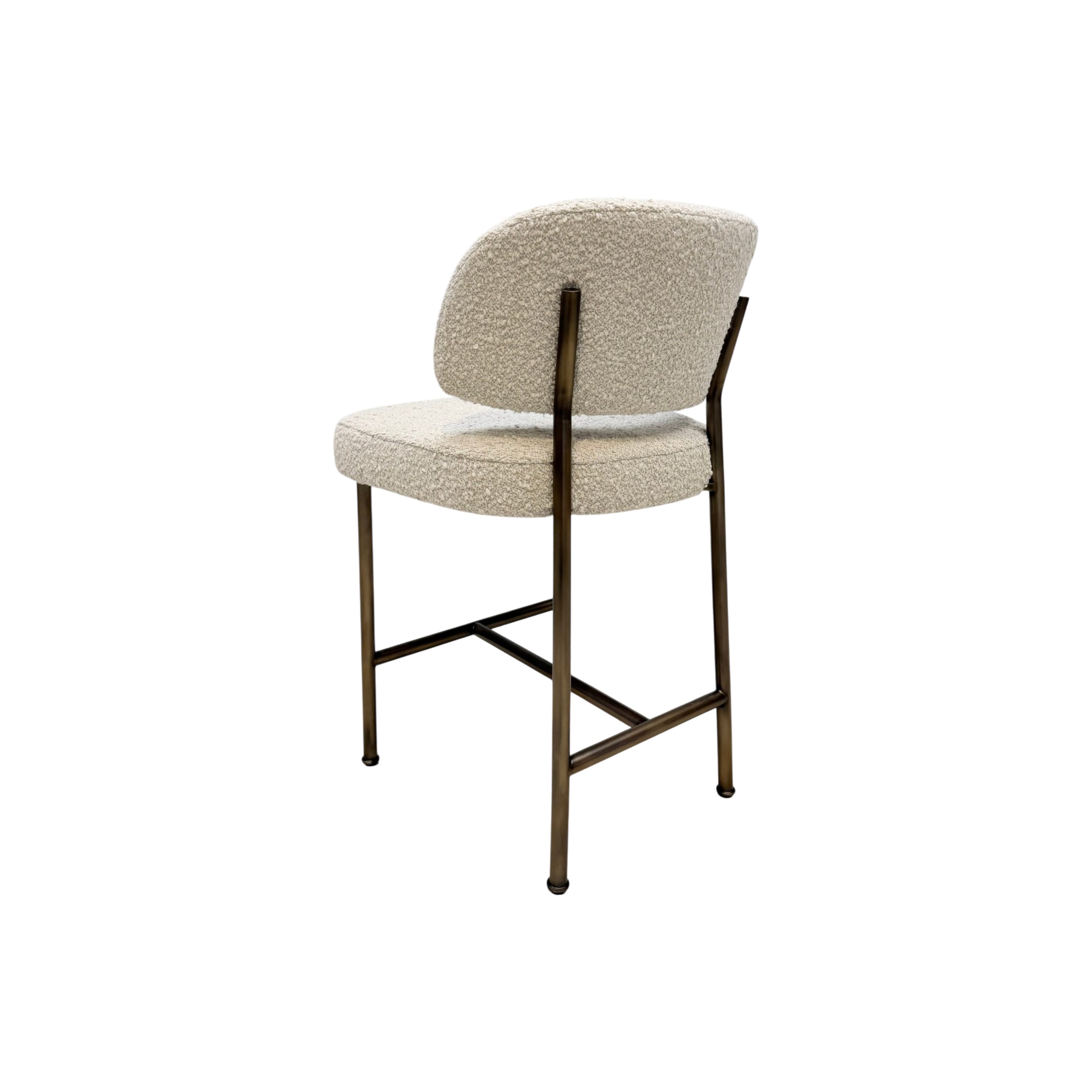 A modern bar stool with a textured cream bouclé upholstered seat and curved backrest, supported by a slim bronze-finished metal frame.
