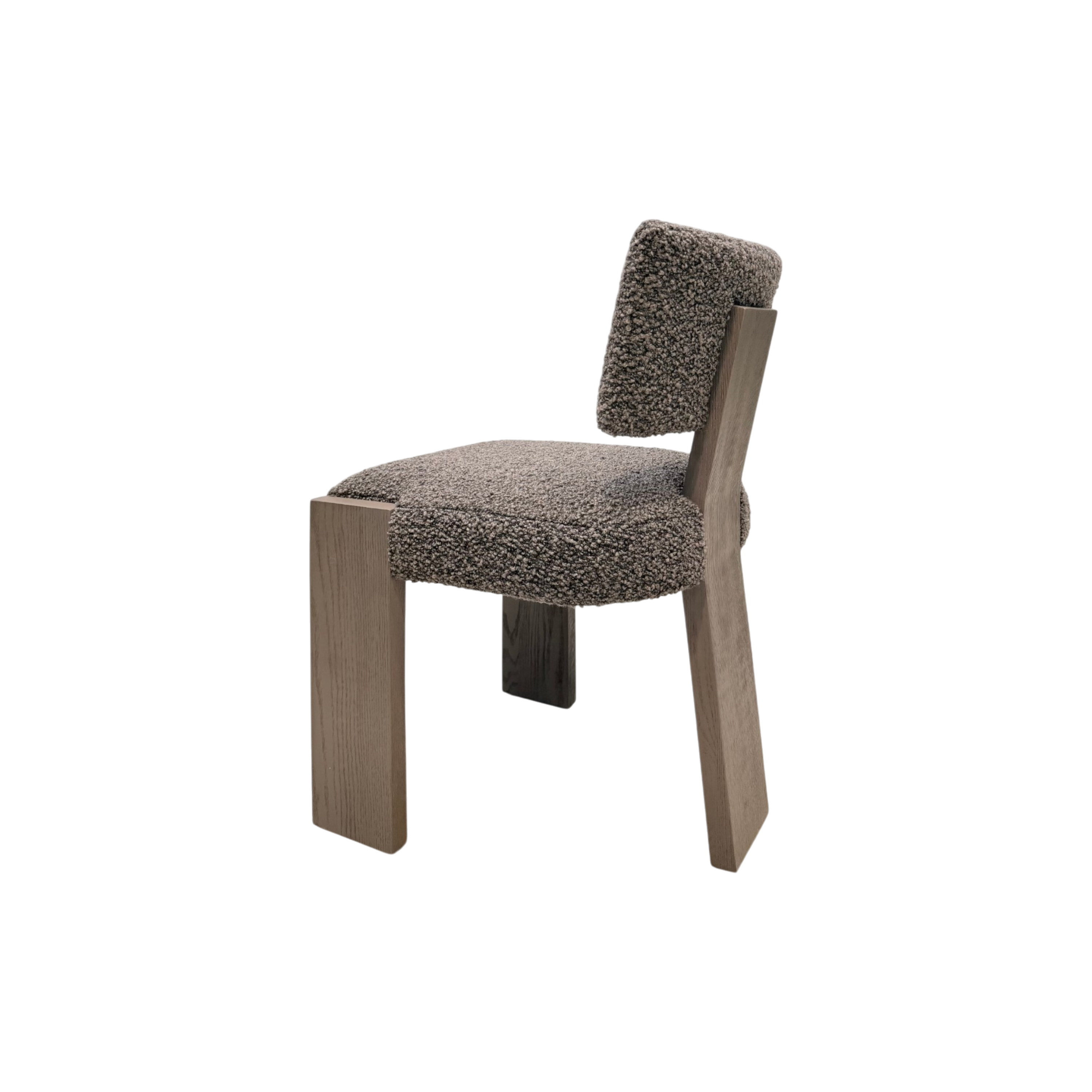 A modern accent chair featuring a chunky, textured taupe-brown bouclé seat and back cushion mounted on a light brown wooden frame, shown against a plain white background.