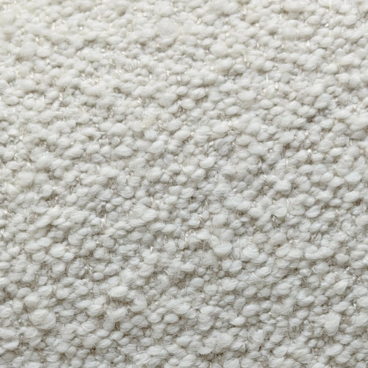 Close-up of Grey Oak upholstery showing the soft, nubby woven texture used on the Arcus Swivel Chair.