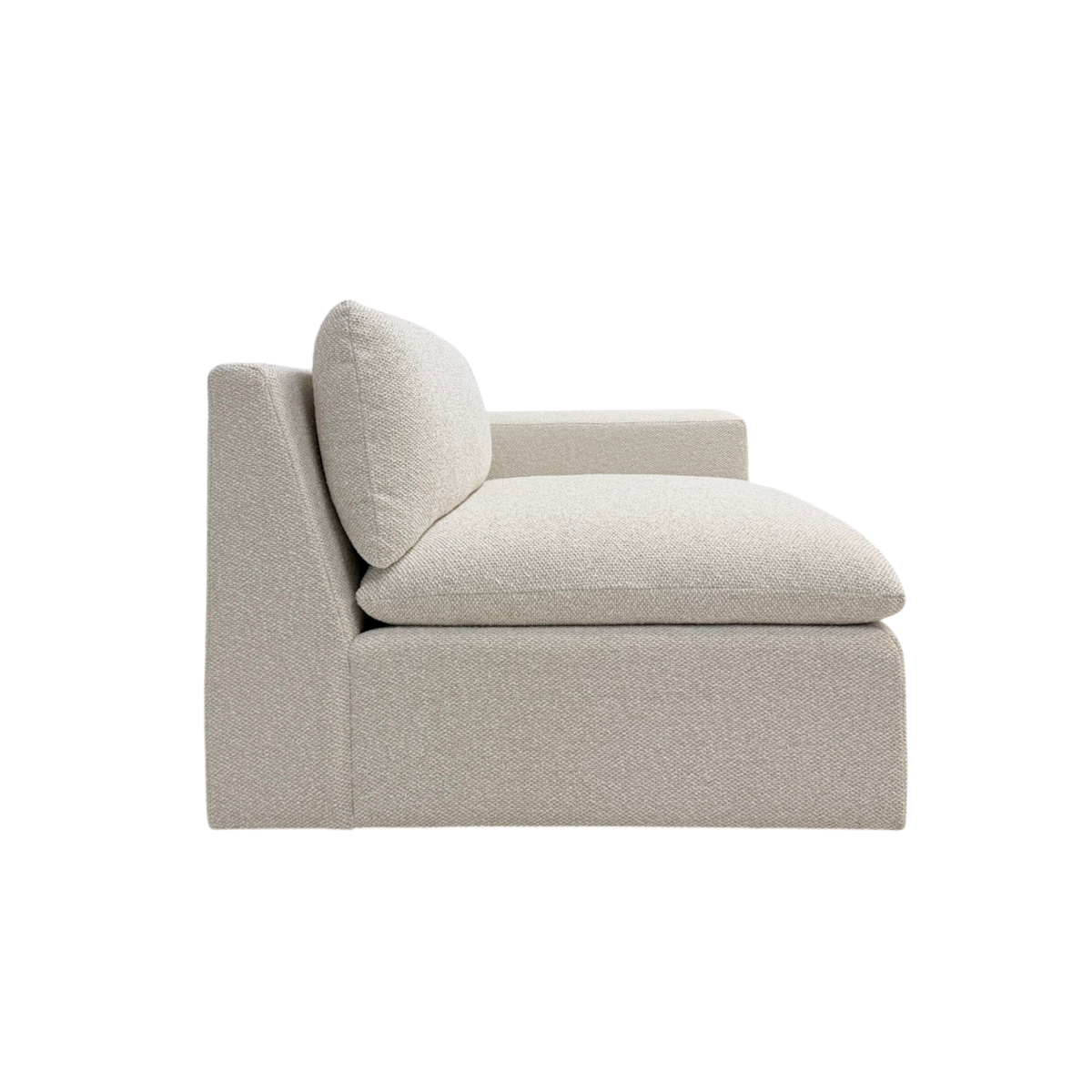 Tempo Modular RAF Chair side view highlighting the deep cushioned seat, loose back cushion, and clean low-profile form in ivory textured upholstery.