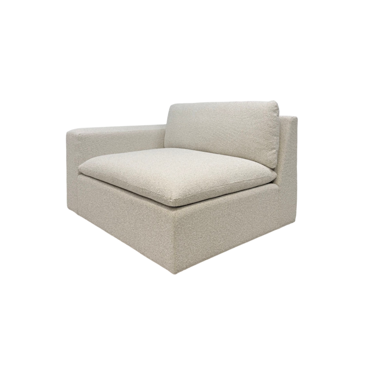 Tempo Modular LAF Chair in ivory textured upholstery, shown in an angled view with a low-profile frame, left arm, and oversized loose seat and back cushions.