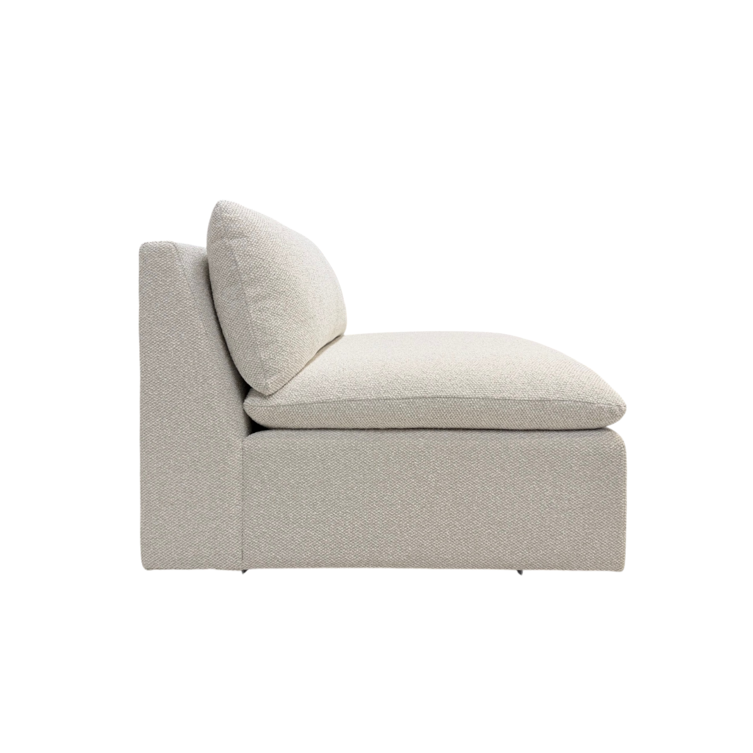 Tempo Modular Armless Chair side view showing the deep cushioned seat, loose back cushion, and clean armless modular design in ivory textured fabric.
