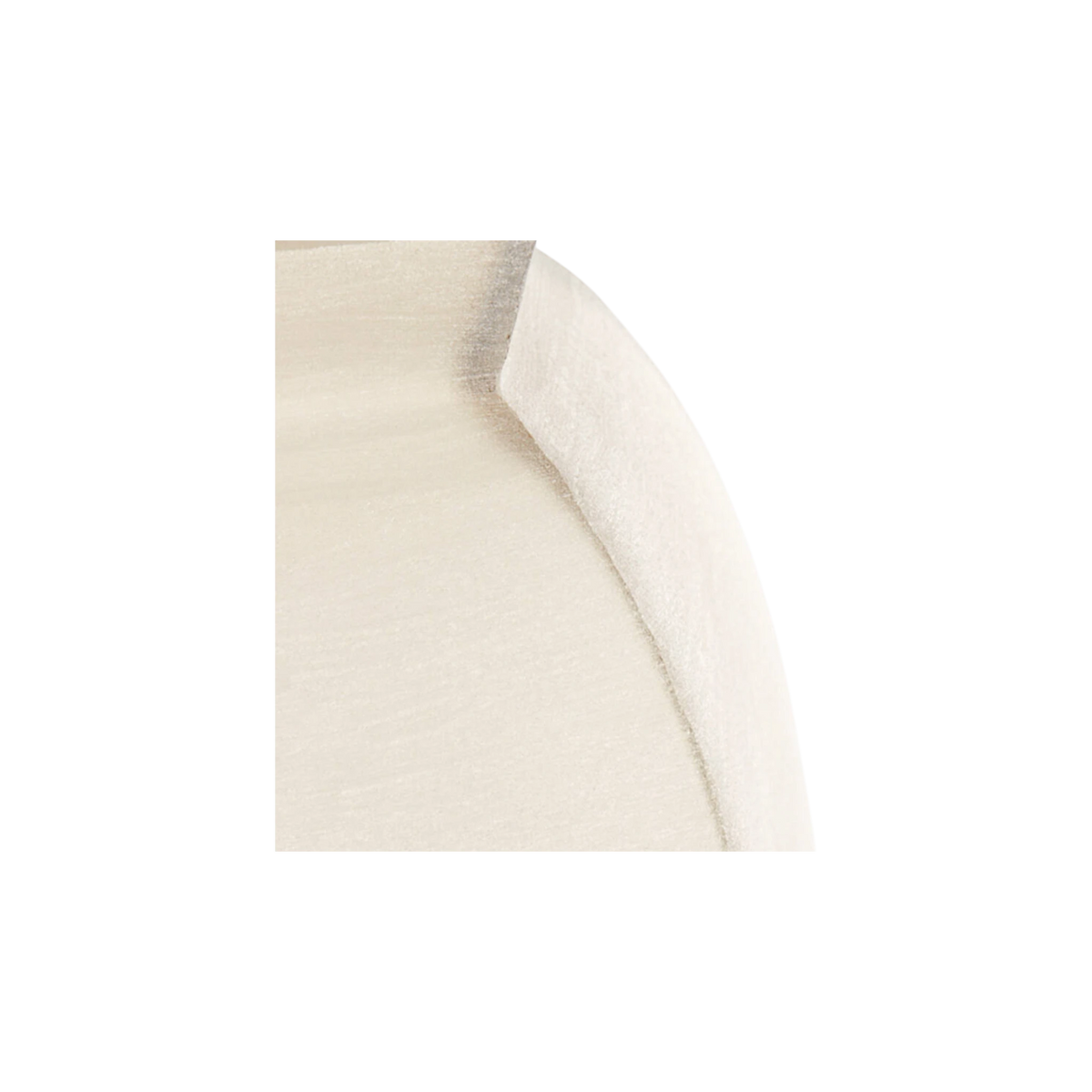 Close-up showing the shoulder of the frosted ivory glass vase, with a crisp seam where the smooth panel meets a softly textured facet.